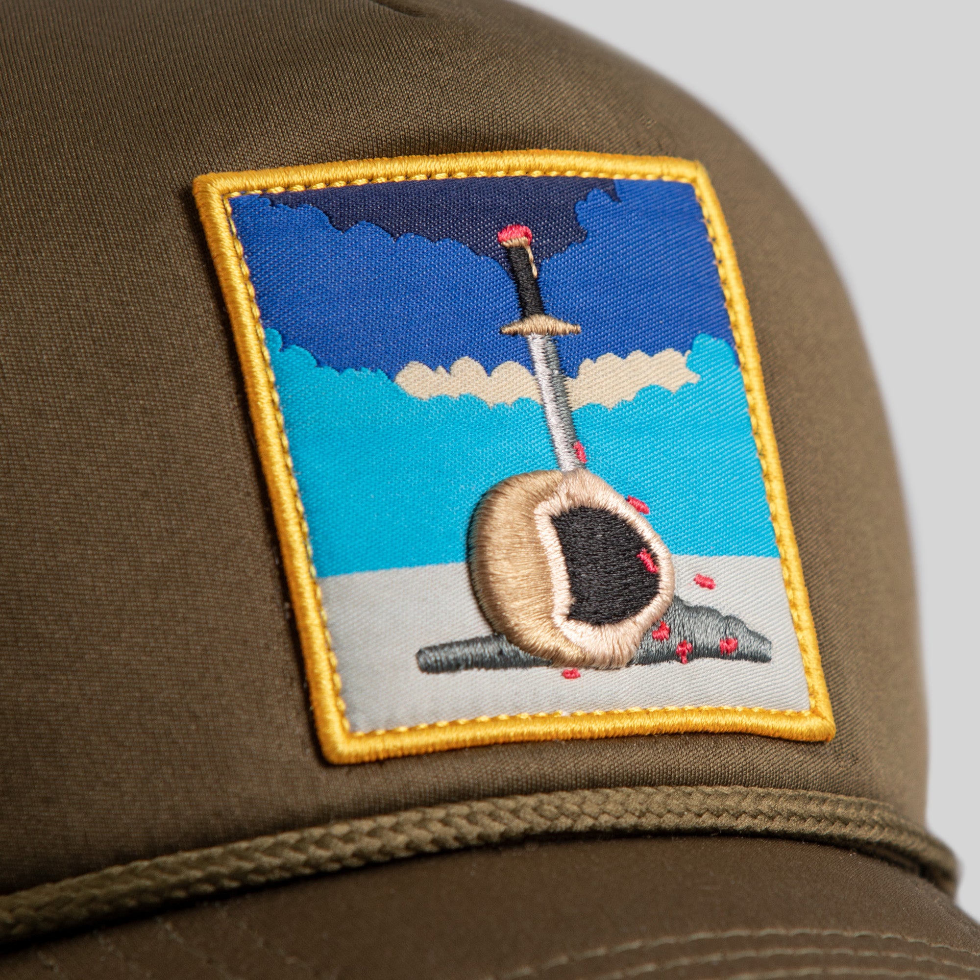 FIELD GRADE X KURVE STUDIO HEAVY IS THE HEAD OLIVE TRUCKER