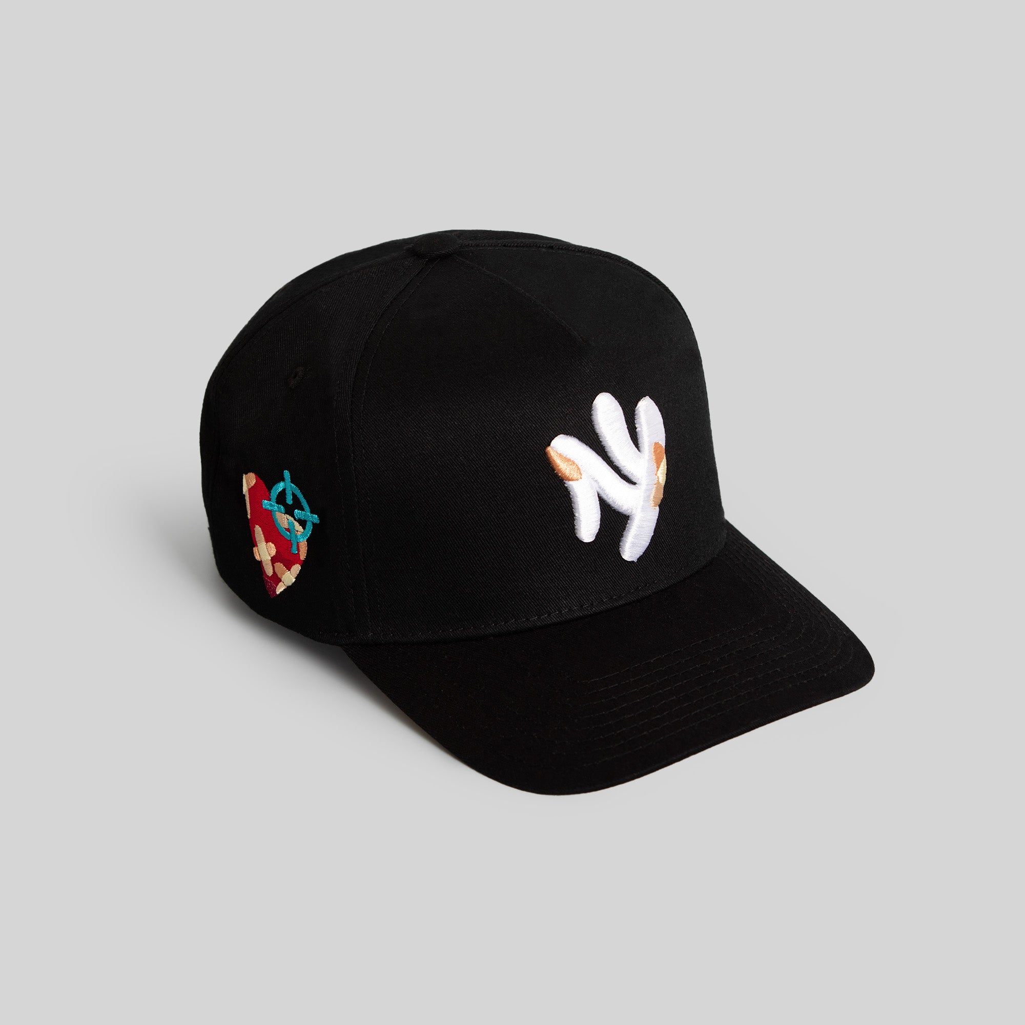FIELD GRADE X KURVE STUDIO NY IS HEALING BLACK TRUCKER HAT
