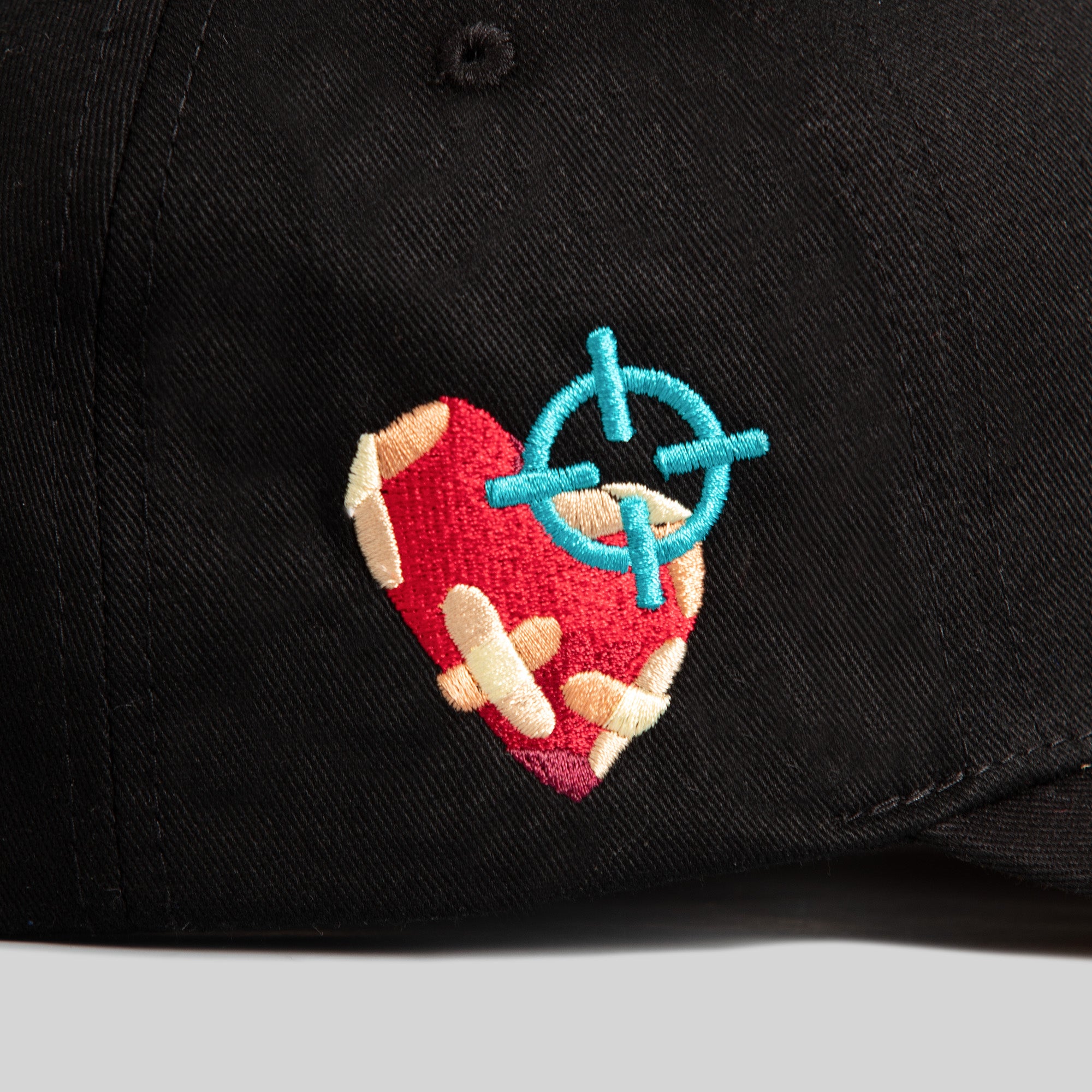FIELD GRADE X KURVE STUDIO NY IS HEALING BLACK TRUCKER HAT