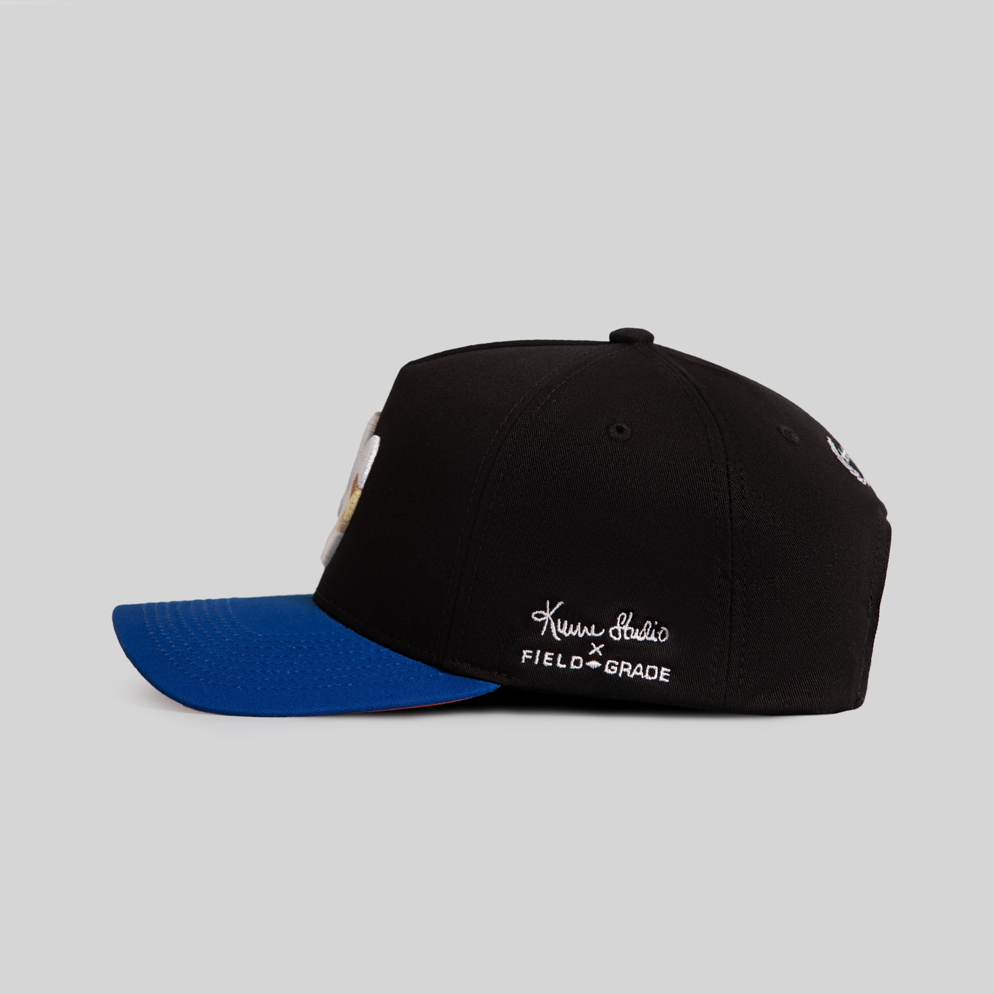 FIELD GRADE X KURVE STUDIO NY IS HEALING ROYAL BLACK TWILL TRUCKER