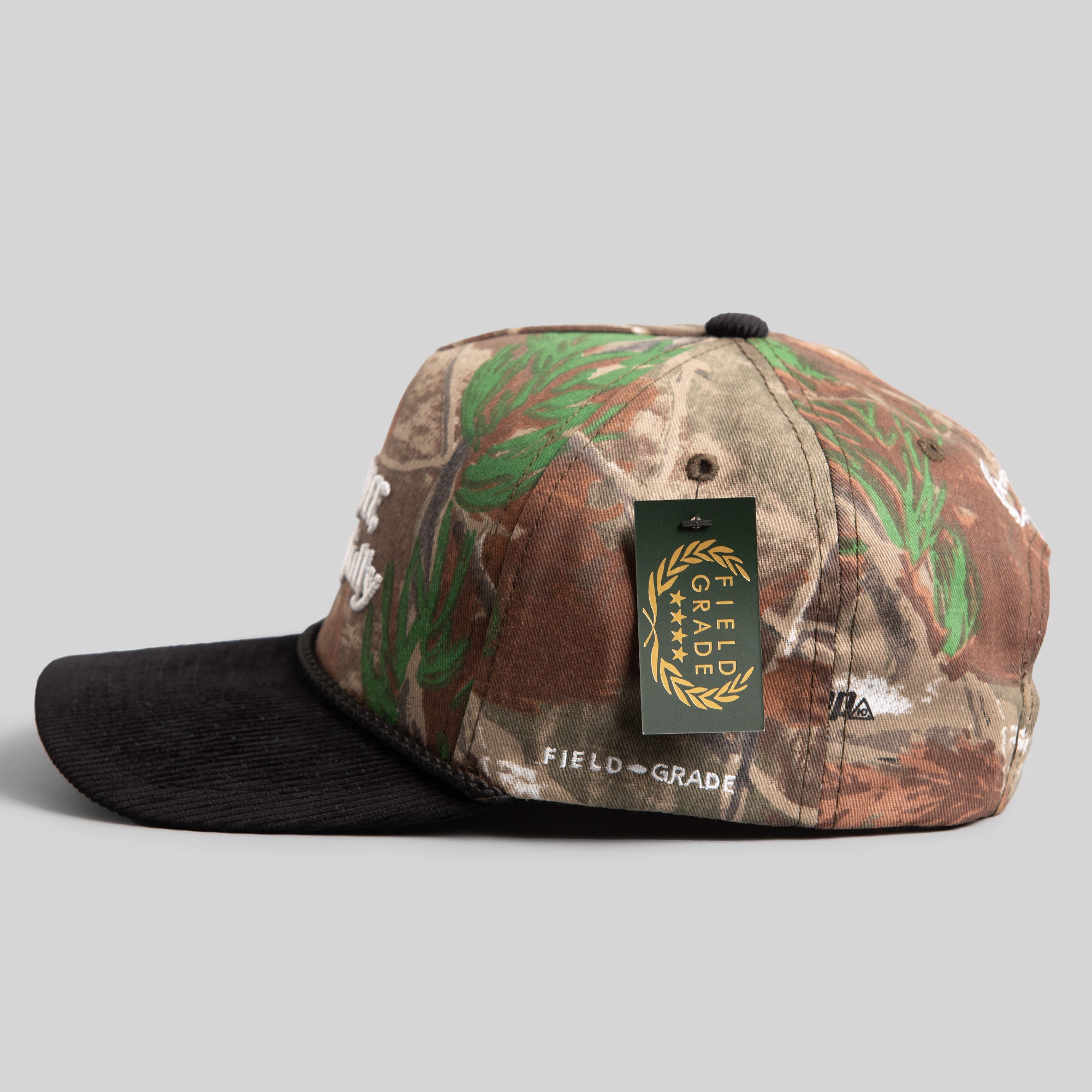 RESPECTFULLY CAMO/BLACK TRUCKER HAT