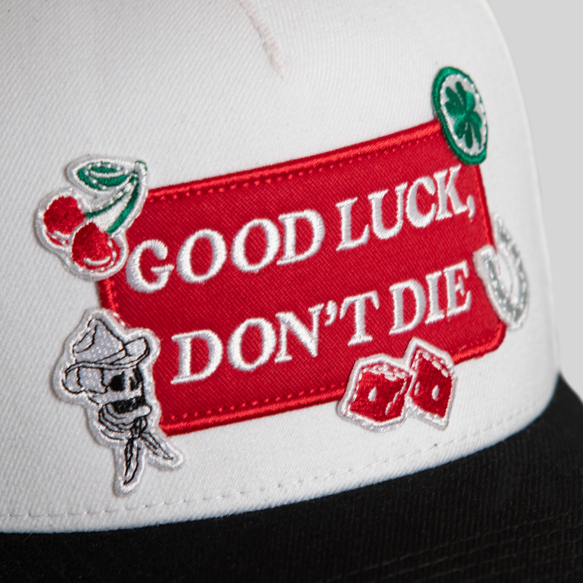 GOOD LUCK DON'T DIE OFF WHITE BLACK WOOL TRUCKER