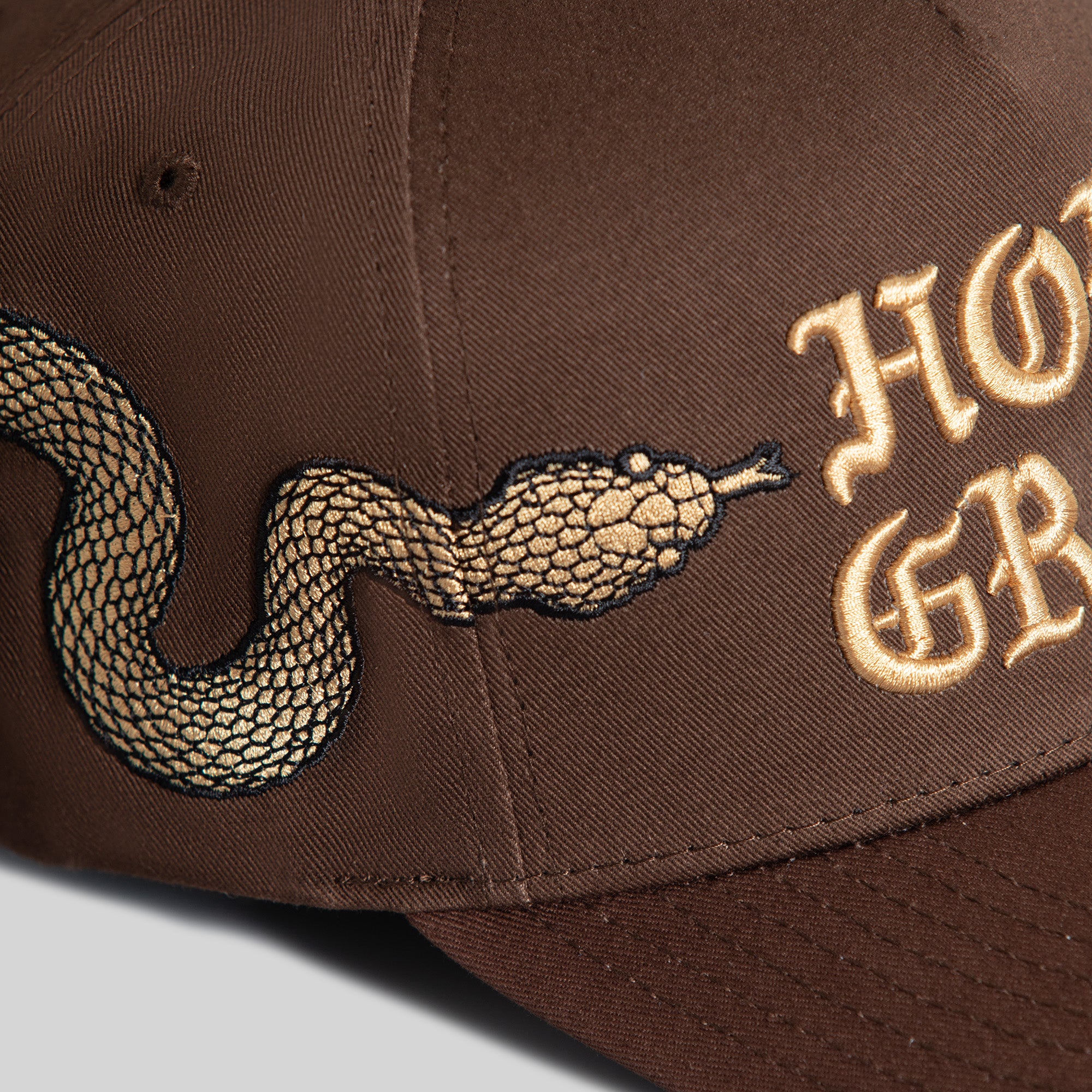HOLY GRAIL SERPENT MOCHA TWILL TRUCKER