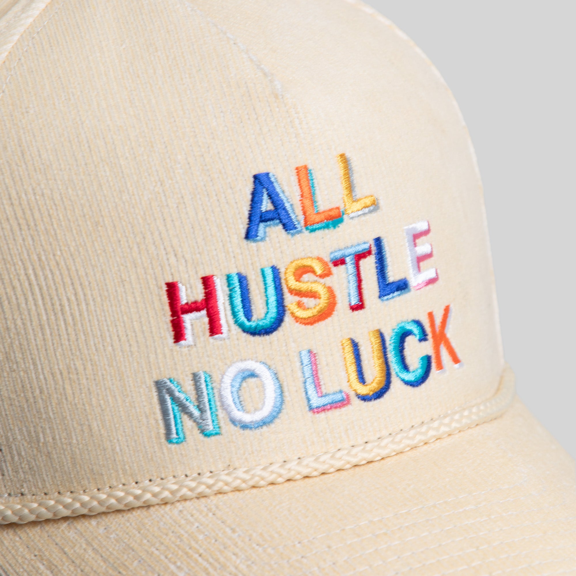 ALL HUSTLE NO LUCK SAND CORDUROY TRUCKER HAT