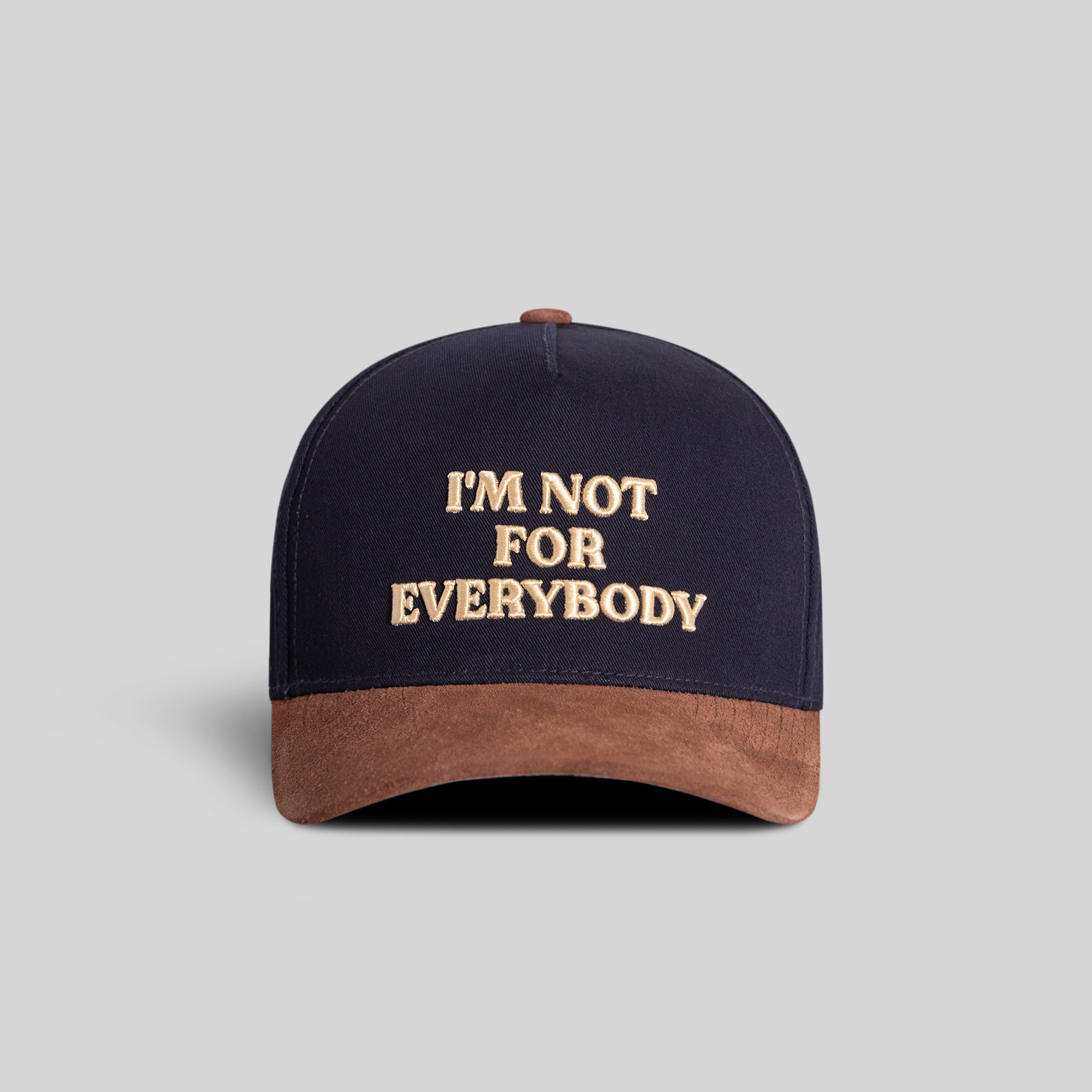 I'M NOT FOR EVERYBODY NAVY MOCHA TWILL SUEDE TRUCKER