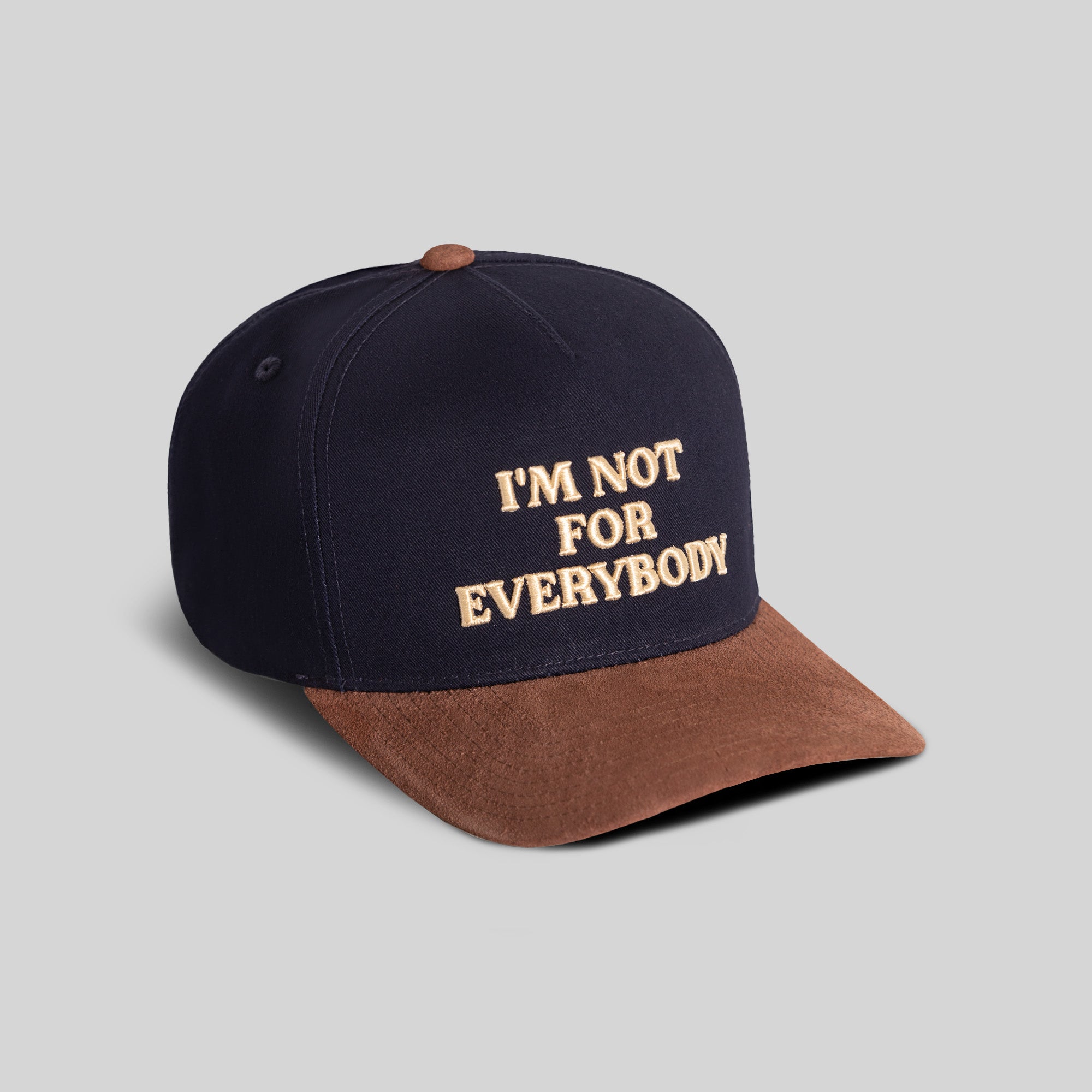 I'M NOT FOR EVERYBODY NAVY MOCHA TWILL SUEDE TRUCKER