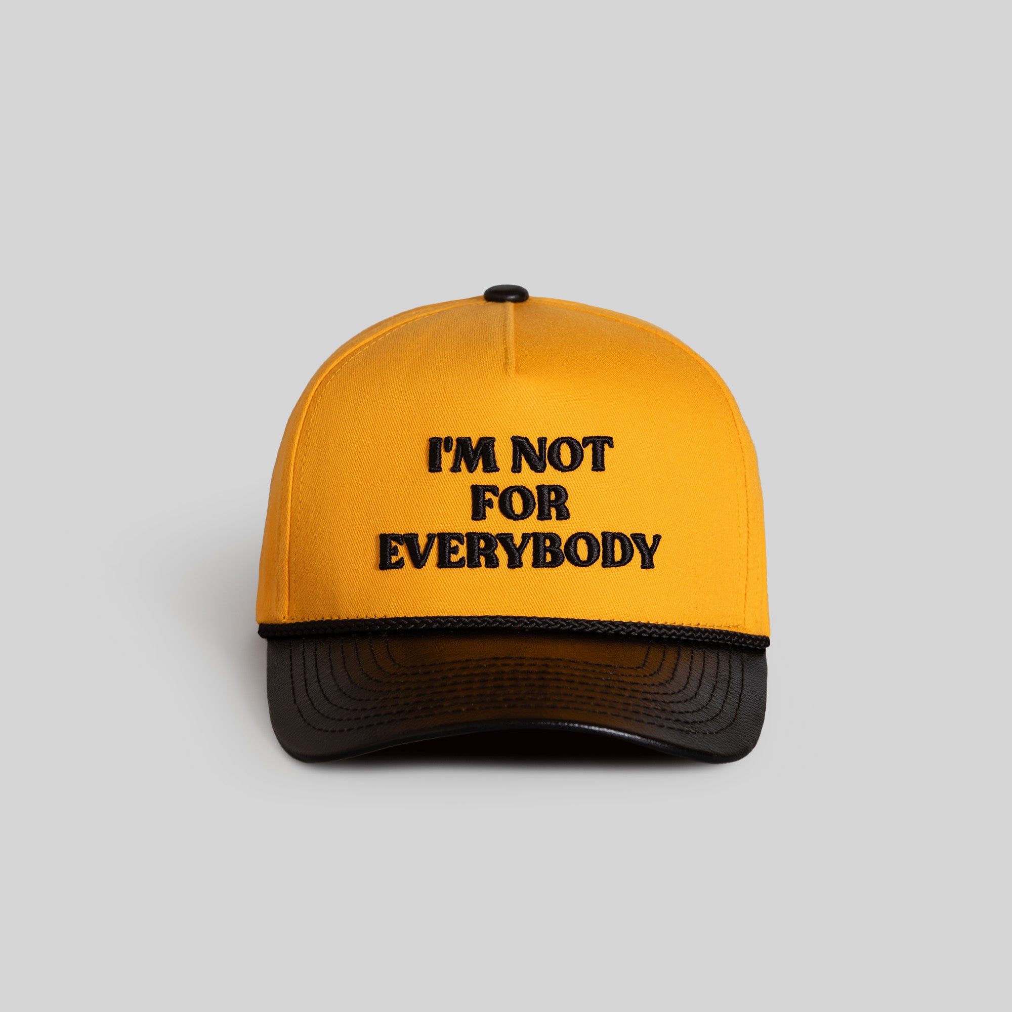 I'M NOT FOR EVERYBODY YELLOW GOLD BLACK TWILL LEATHER TRUCKER