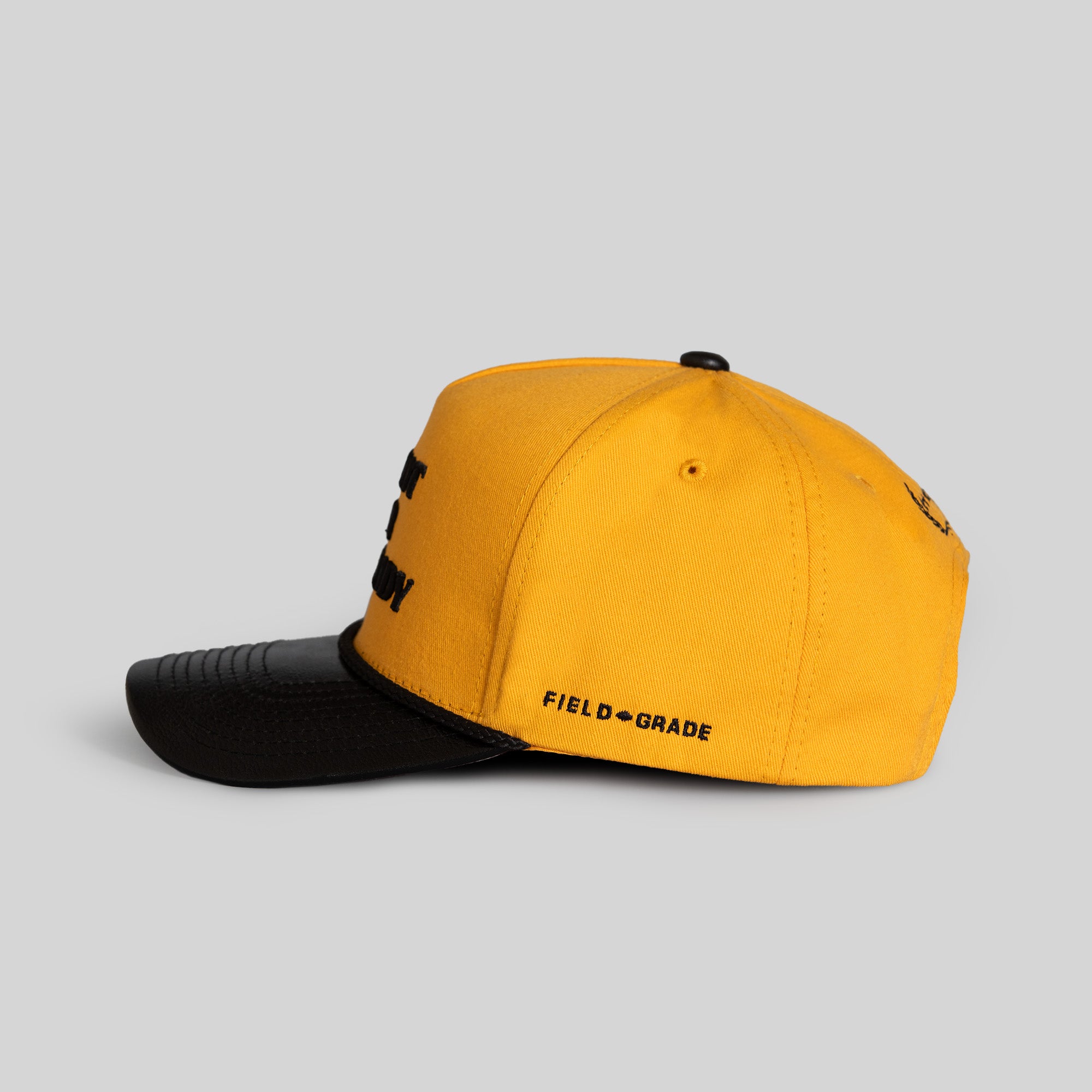 I'M NOT FOR EVERYBODY YELLOW GOLD BLACK TWILL LEATHER TRUCKER
