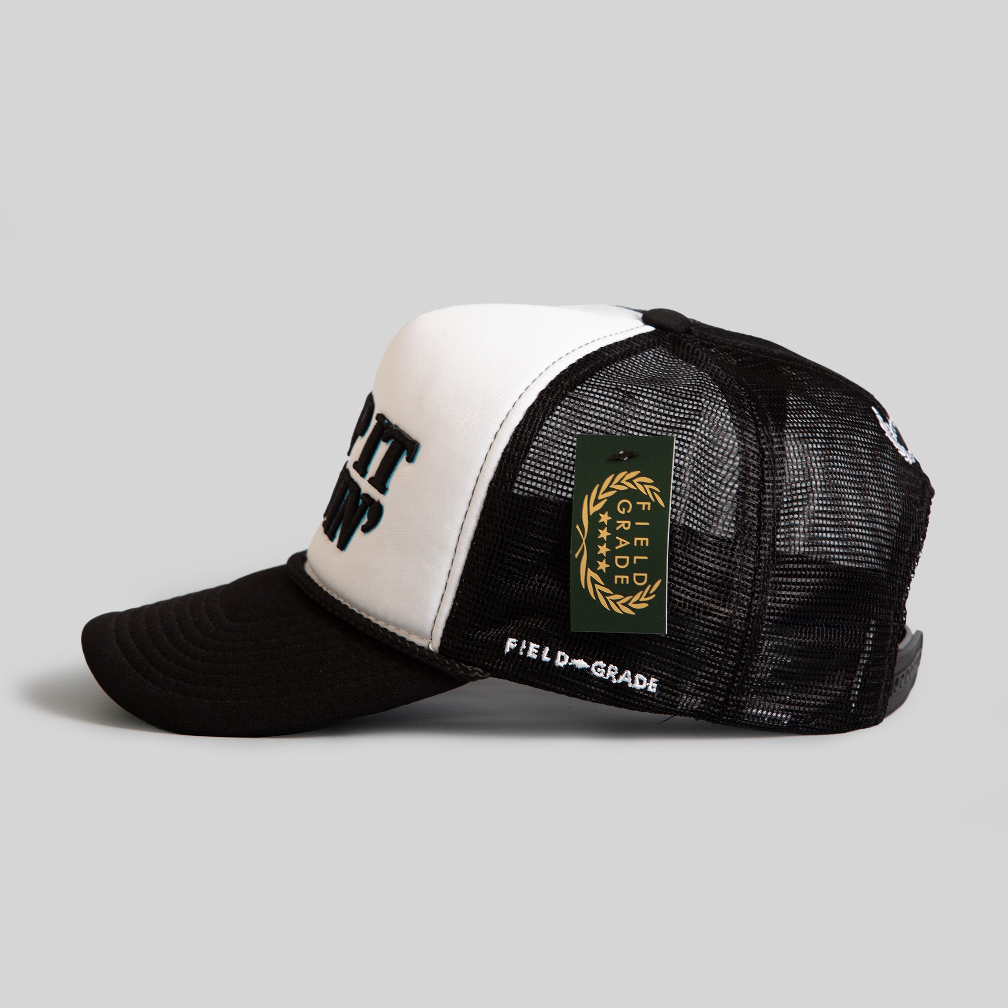 KEEP IT MOVIN' WHITE BLACK TRUCKER HAT