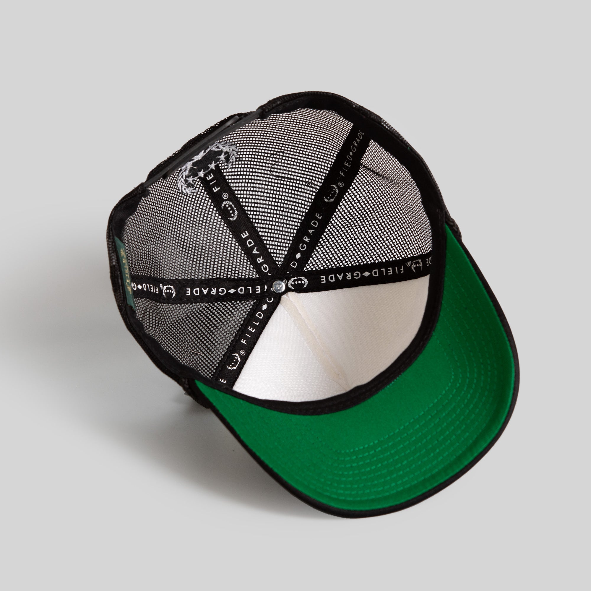 KEEP IT MOVIN' WHITE BLACK TRUCKER HAT