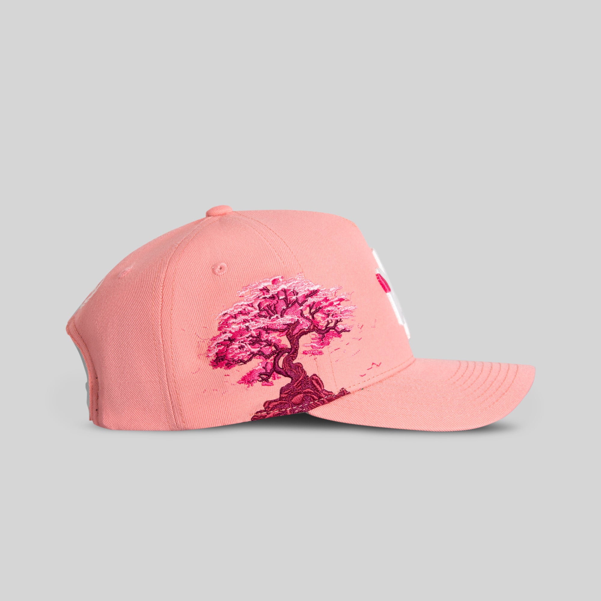 FIELD GRADE X KURVE STUDIO NY IS HEALING CHERRY BLOSSOM WOOL TRUCKER