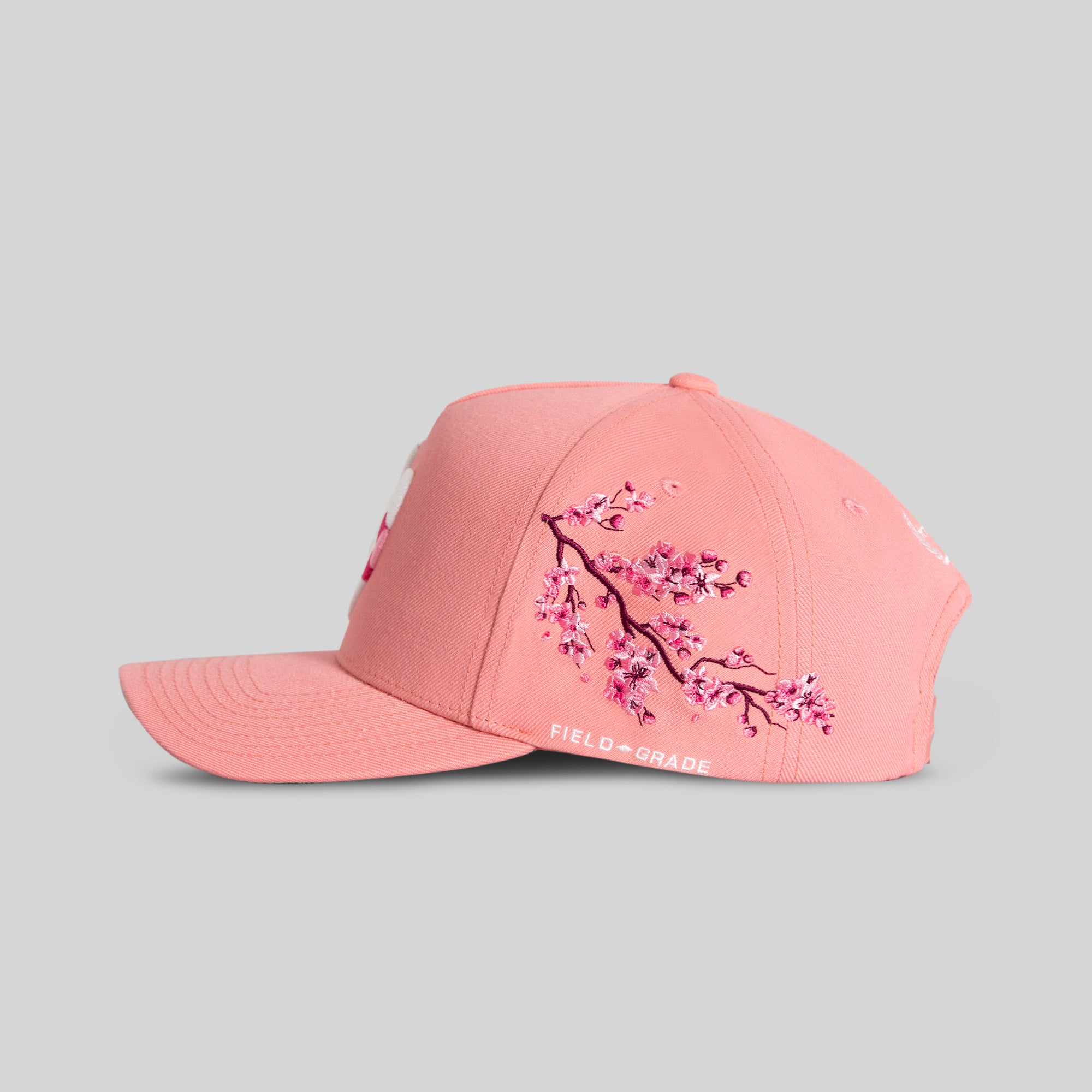 FIELD GRADE X KURVE STUDIO NY IS HEALING CHERRY BLOSSOM WOOL TRUCKER