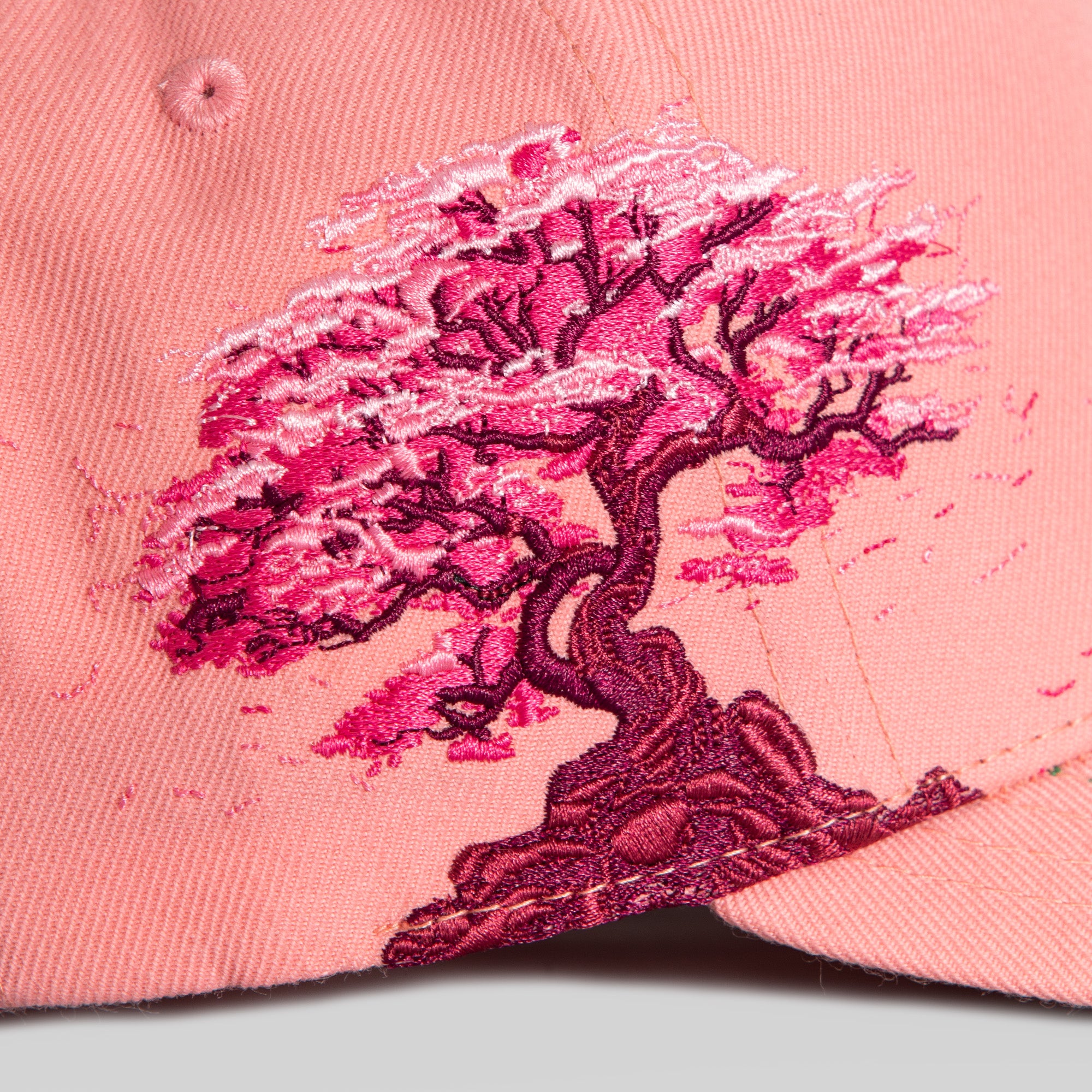 FIELD GRADE X KURVE STUDIO NY IS HEALING CHERRY BLOSSOM WOOL TRUCKER
