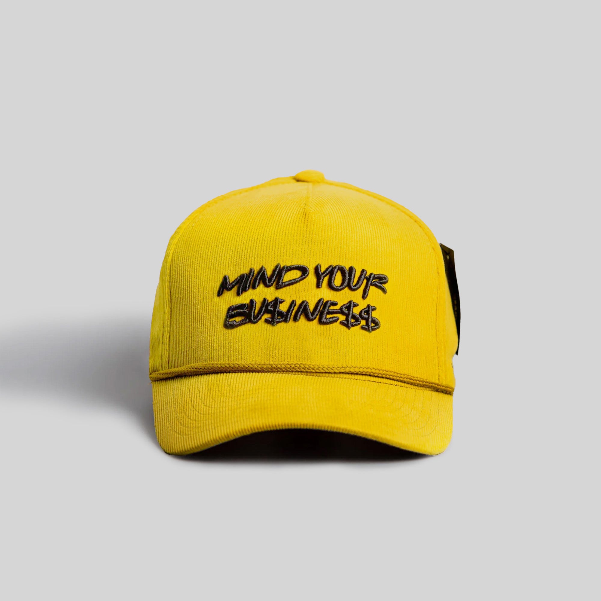 MIND YOUR BUSINESS YELLOW GOLD CORDUROY TRUCKER HAT