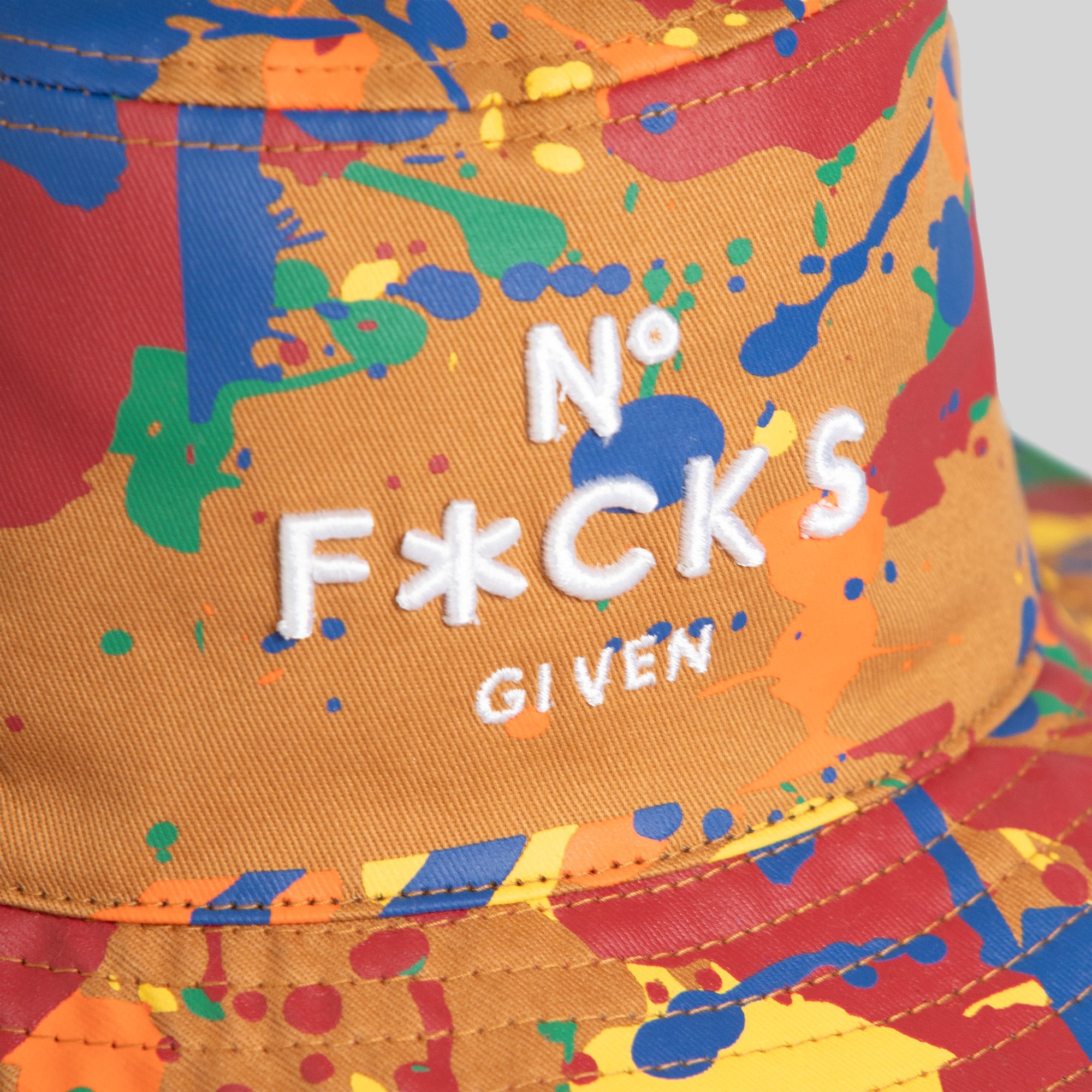 NO F*CKS GIVEN PRIMARY SPLATTER WHEAT BUCKET HAT