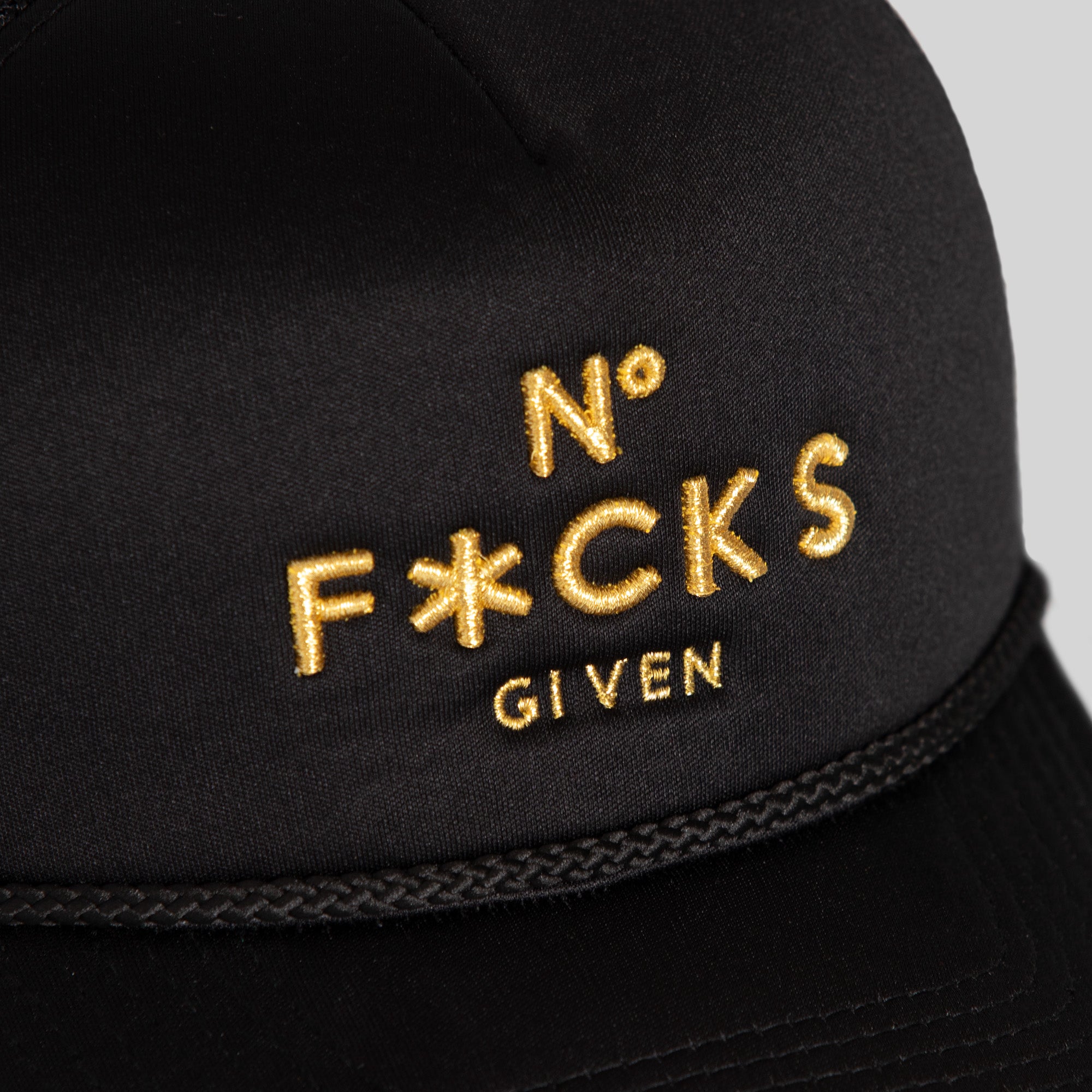 NO F*CKS GIVEN BLACK GOLD FOAM TRUCKER HAT