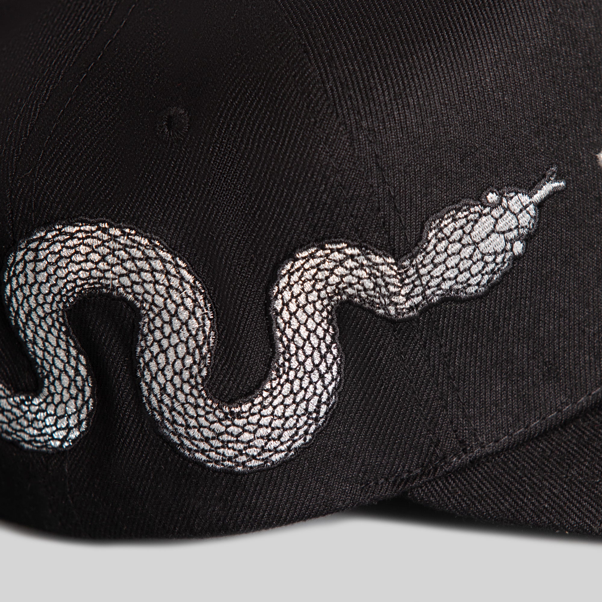 NO F*CKS GIVEN SERPENT BLACK WOOL TRUCKER
