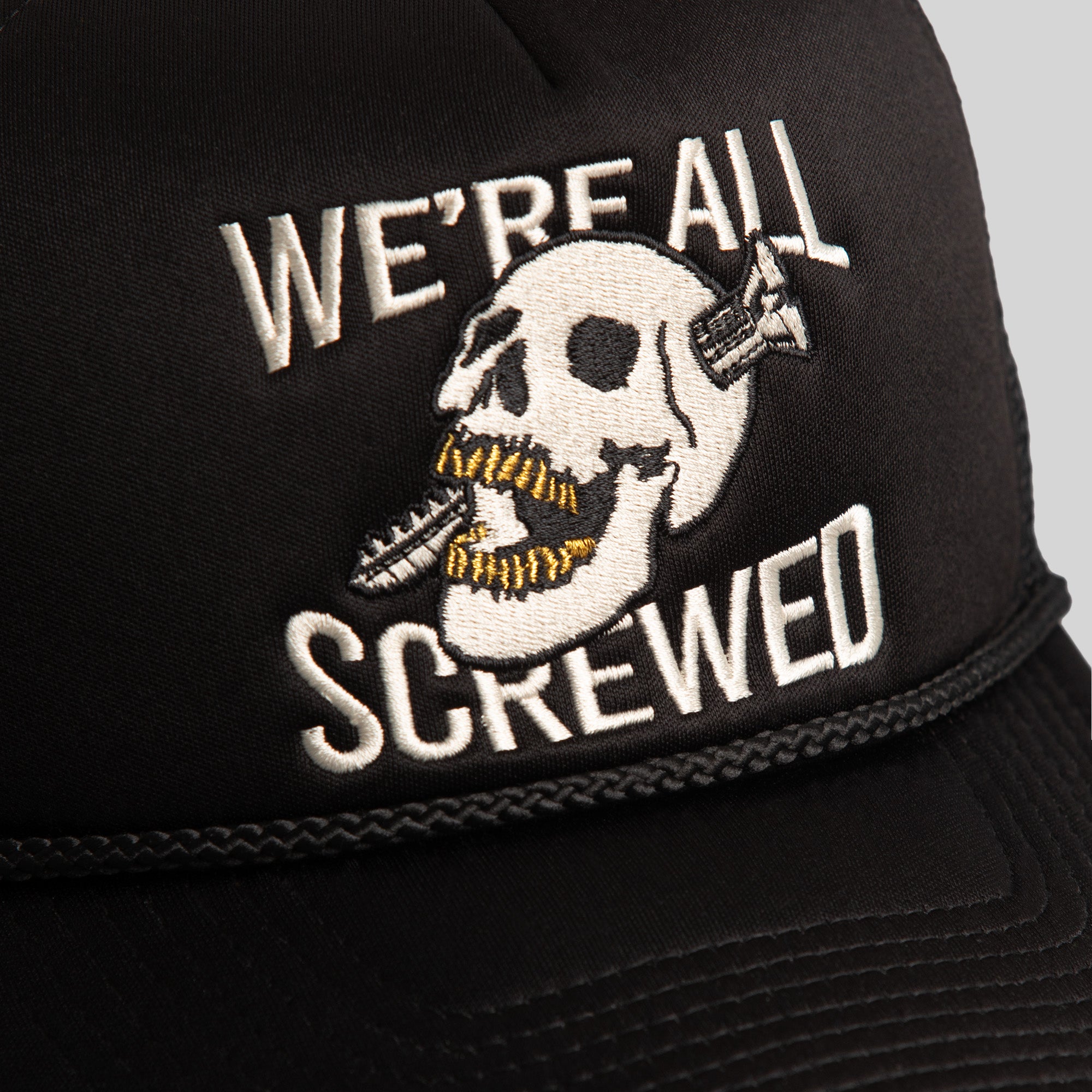 WE'RE ALL SCREWED BLACK TRUCKER HAT