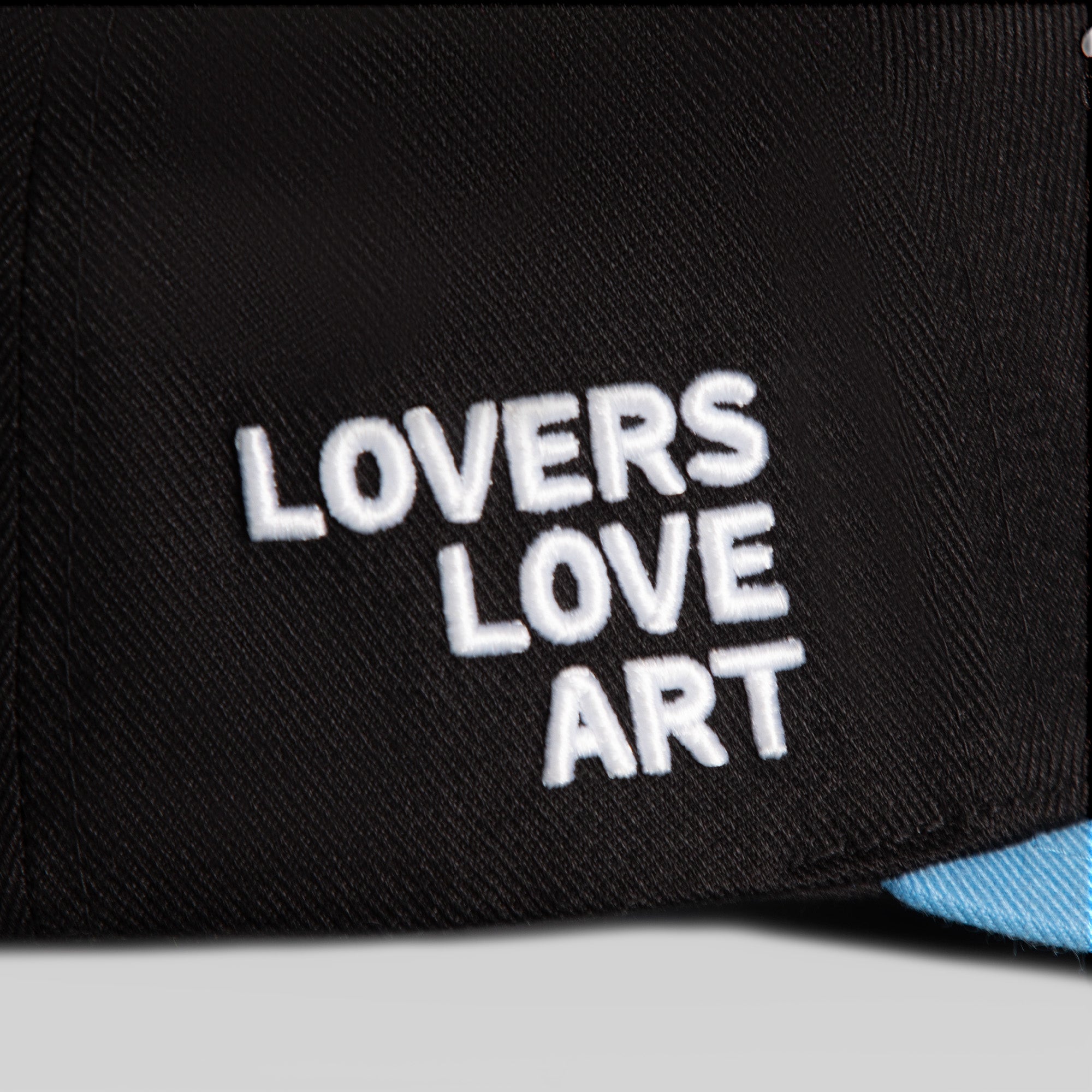 STAY CREATIVE BLACK UNI BLUE WOOL TRUCKER