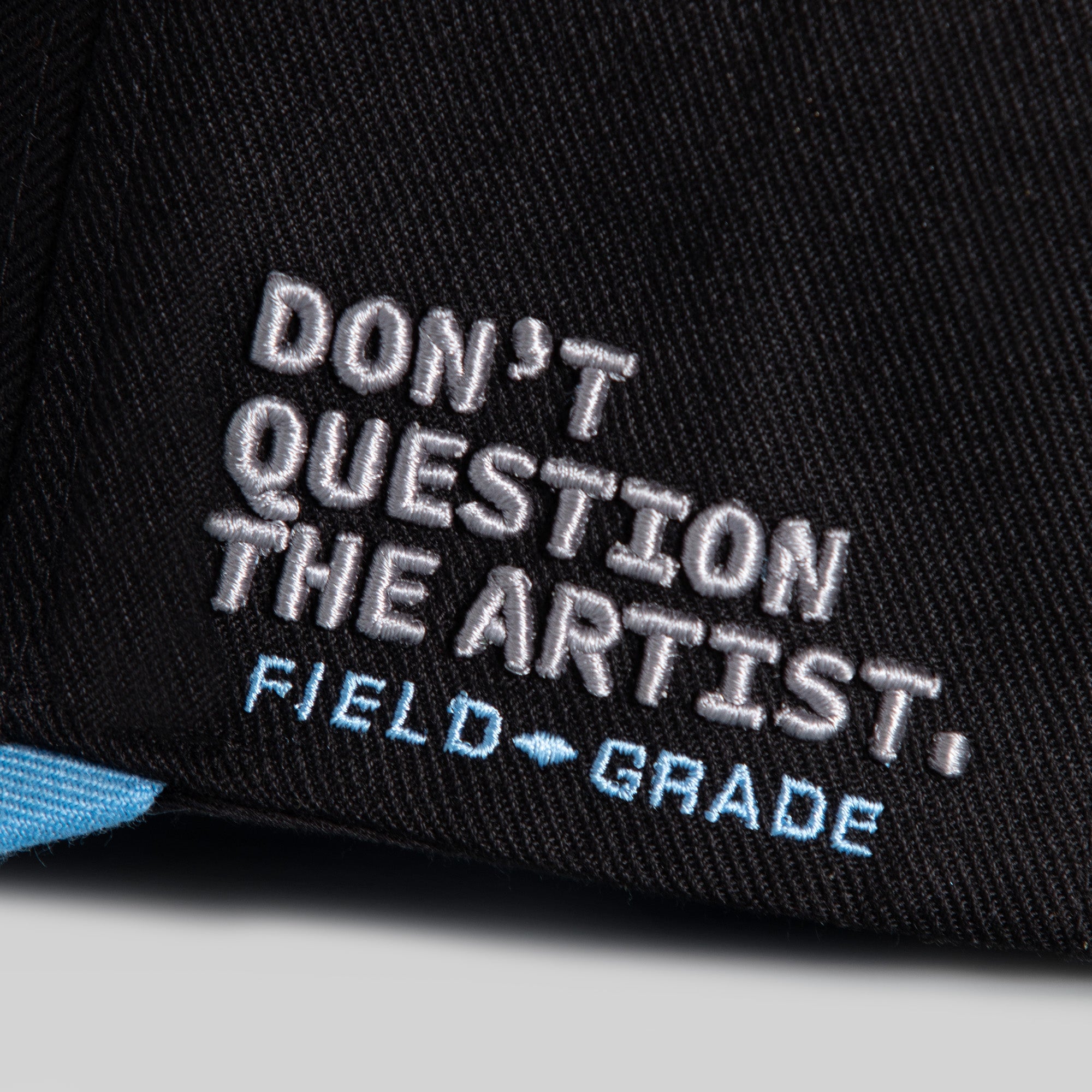 STAY CREATIVE BLACK UNI BLUE WOOL TRUCKER