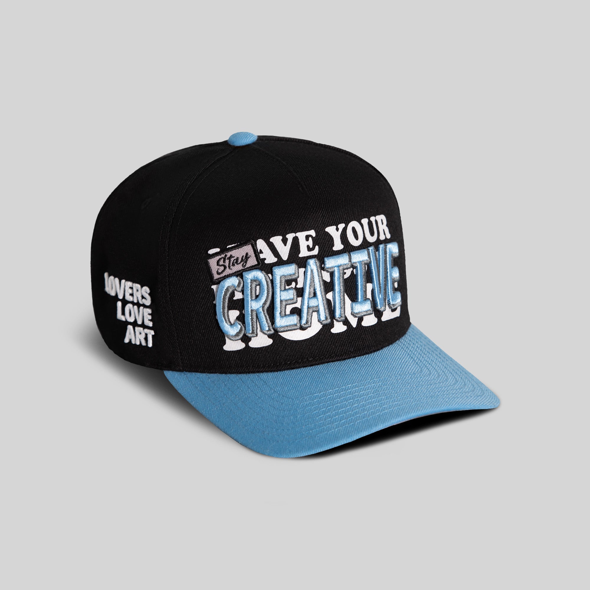 STAY CREATIVE BLACK UNI BLUE WOOL TRUCKER