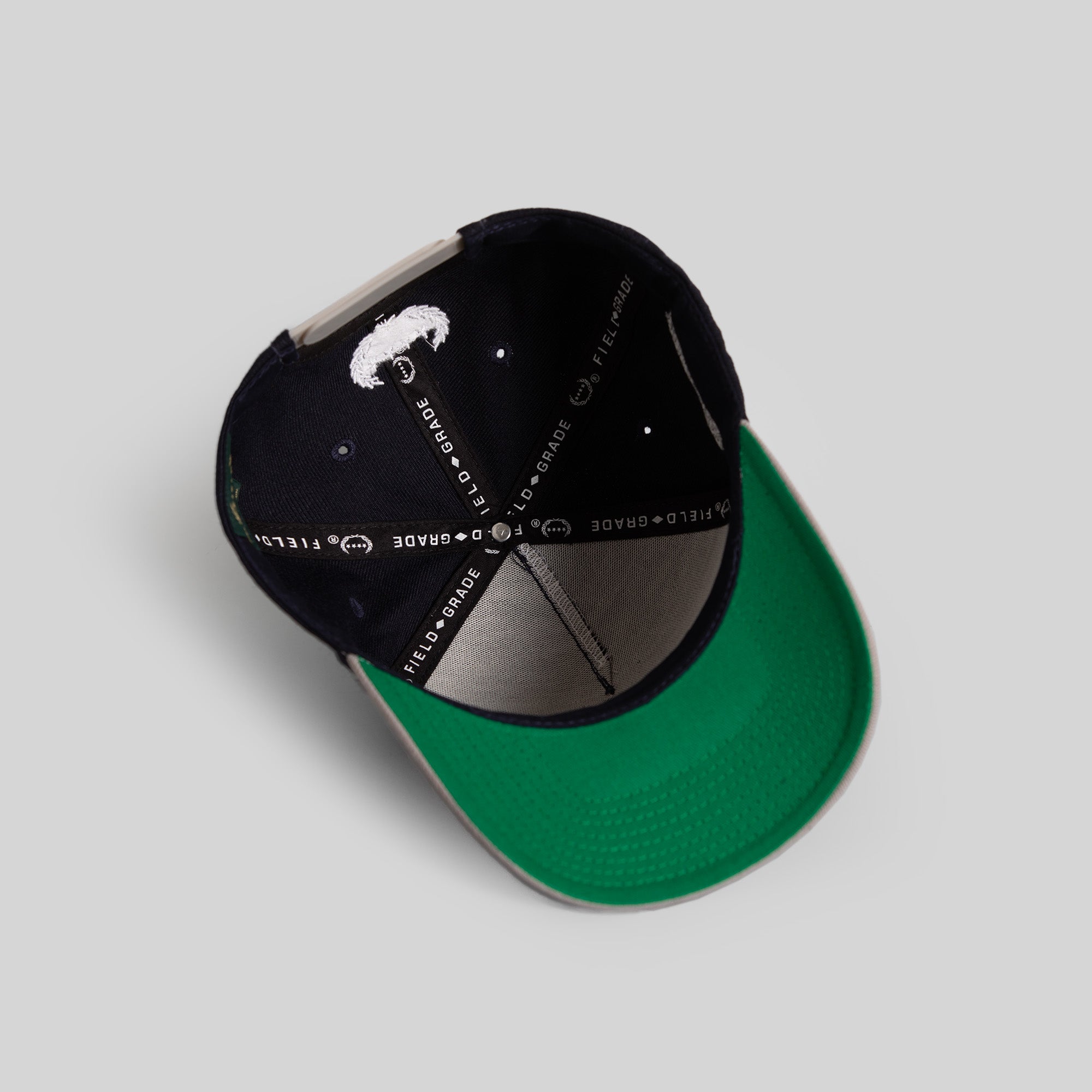 THE WORLD IS MINE DEEP NAVY CEMENT WOOL TRUCKER