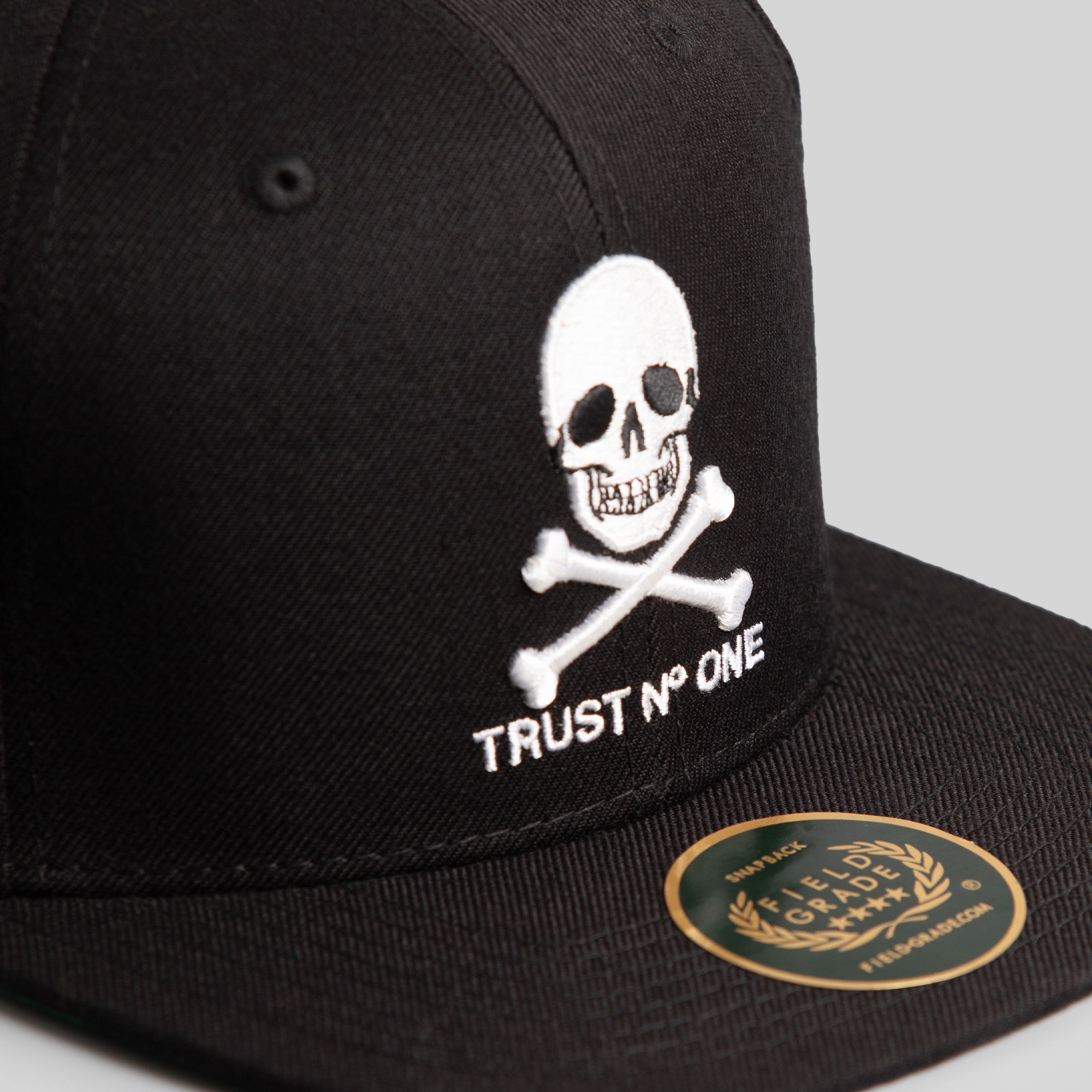 TRUST NO ONE BLACK SNAPBACK HAT