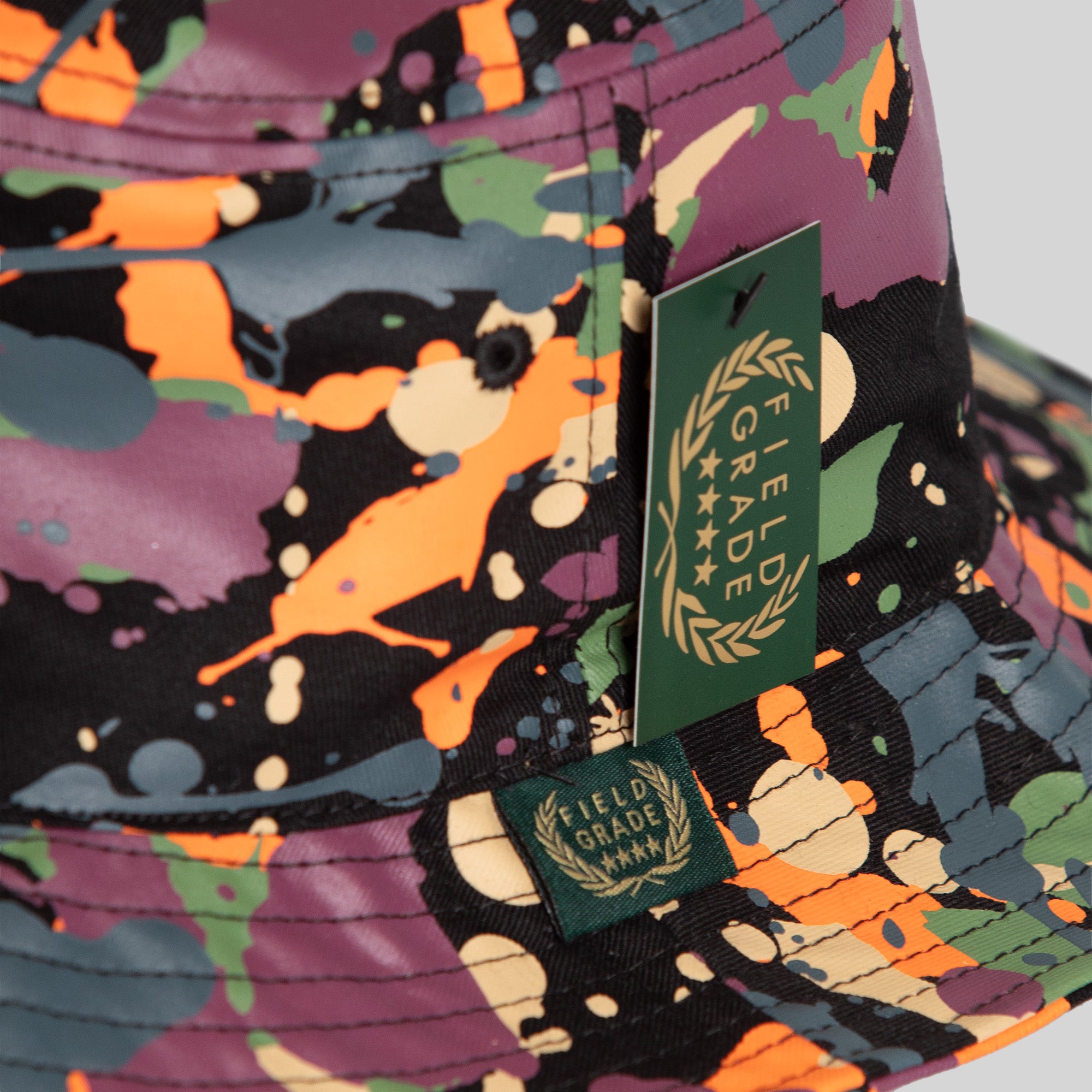 TRUST NO ONE BLACK SPLATTER BUCKET HAT