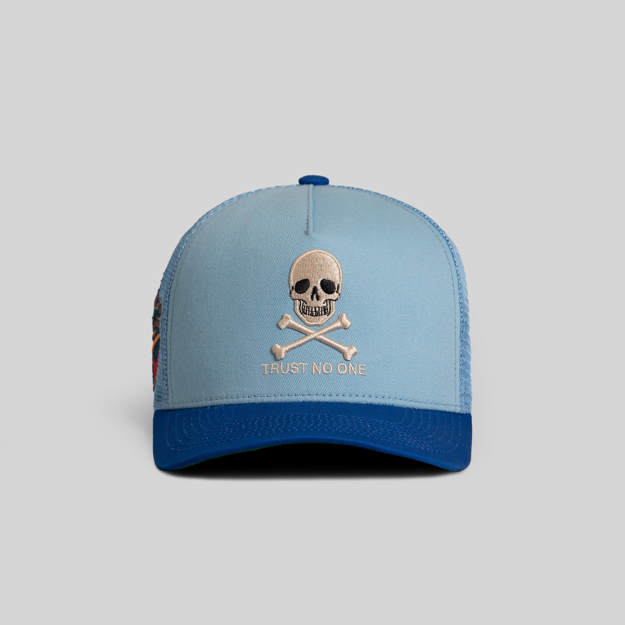 TRUST NO ONE UNI BLUE GAME ROYAL TWILL MESH TRUCKER