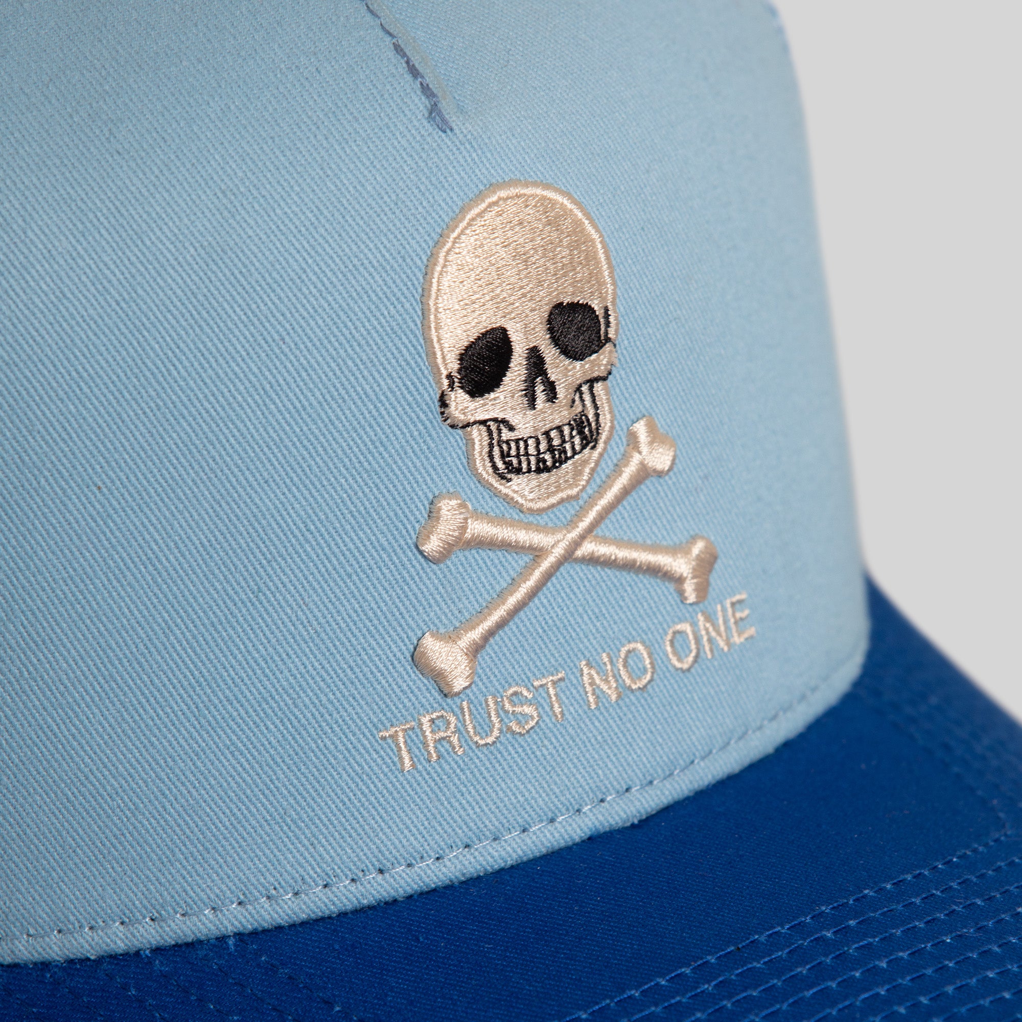 TRUST NO ONE UNI BLUE GAME ROYAL TWILL MESH TRUCKER