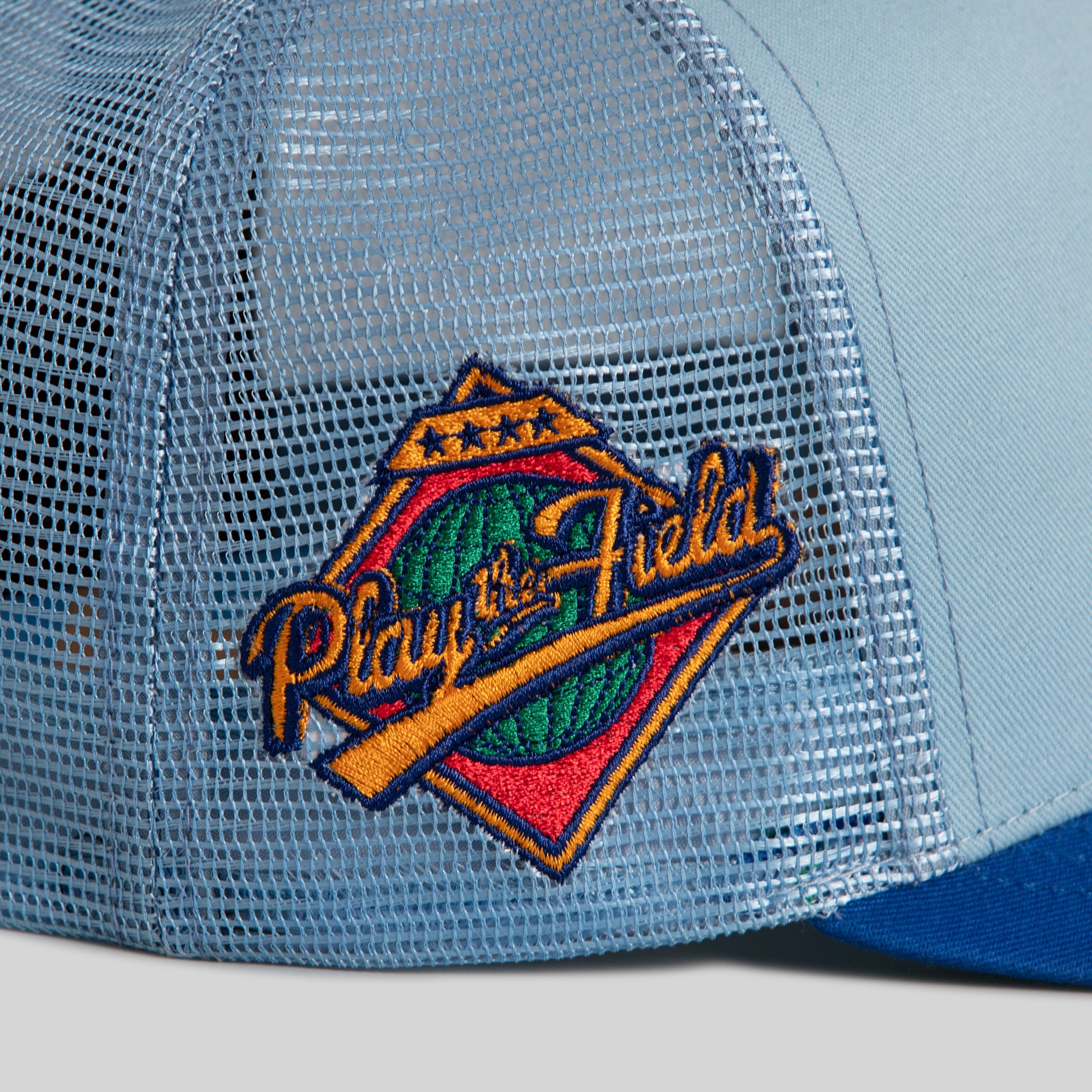 TRUST NO ONE UNI BLUE GAME ROYAL TWILL MESH TRUCKER