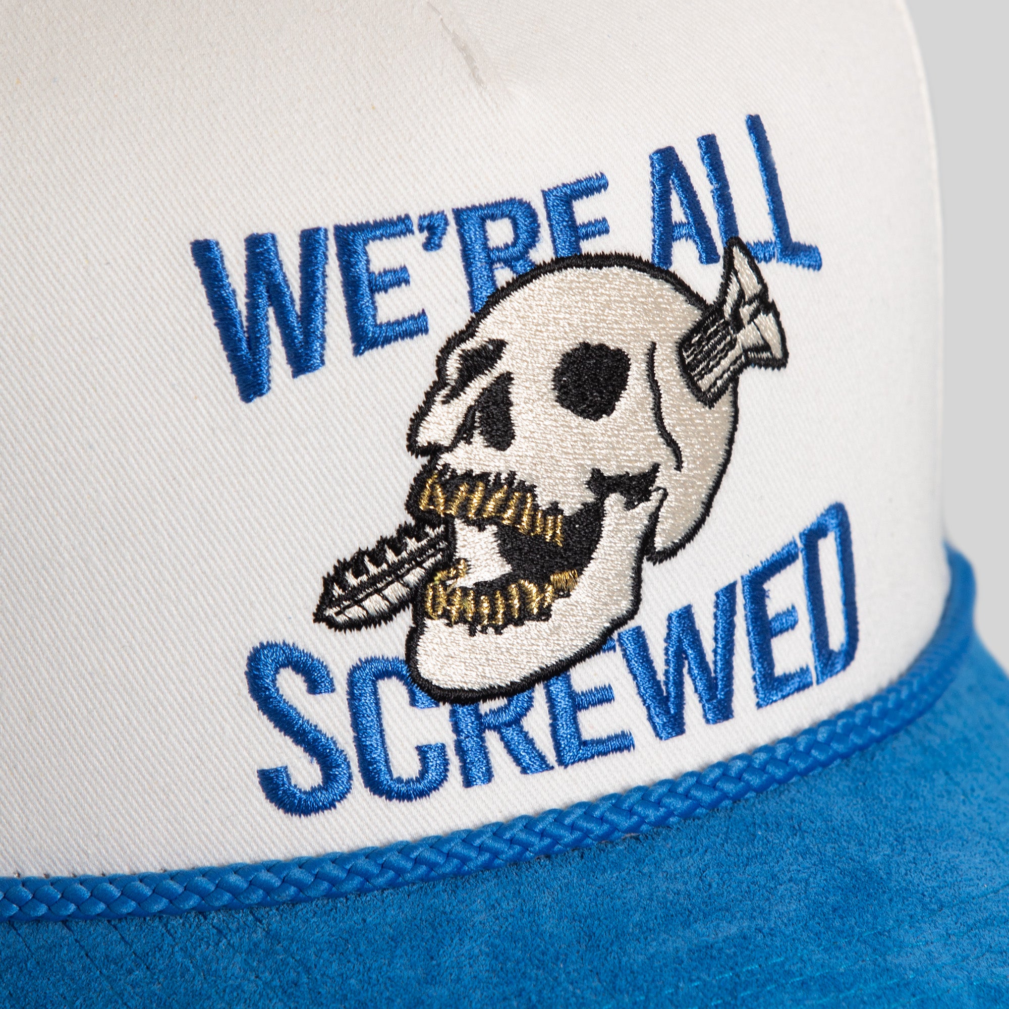 WE'RE ALL SCREWED EGGSHELL GAME ROYAL TWILL SUEDE TRUCKER