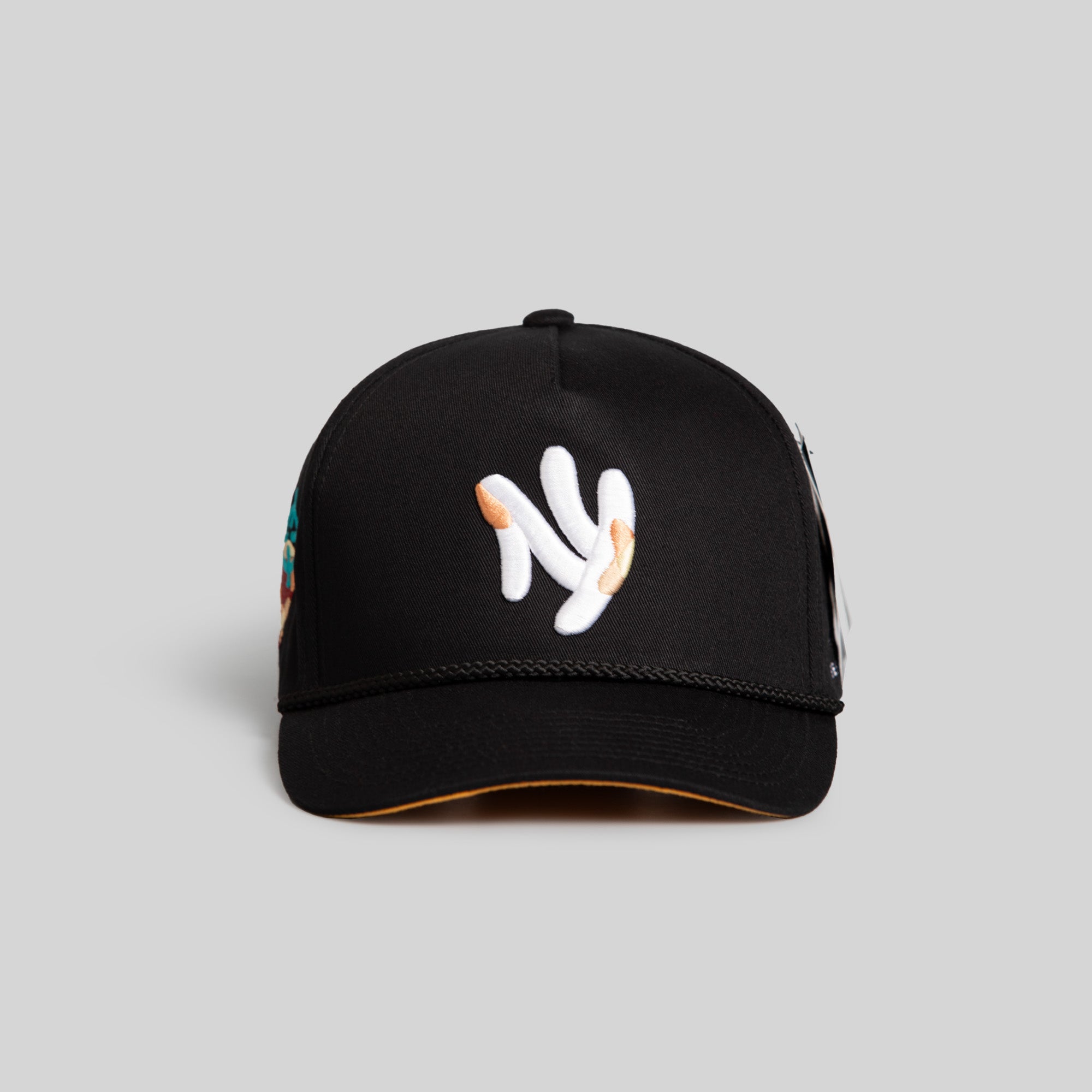 FIELD GRADE X KURVE STUDIO NY IS HEALING BLACK TRUCKER HAT