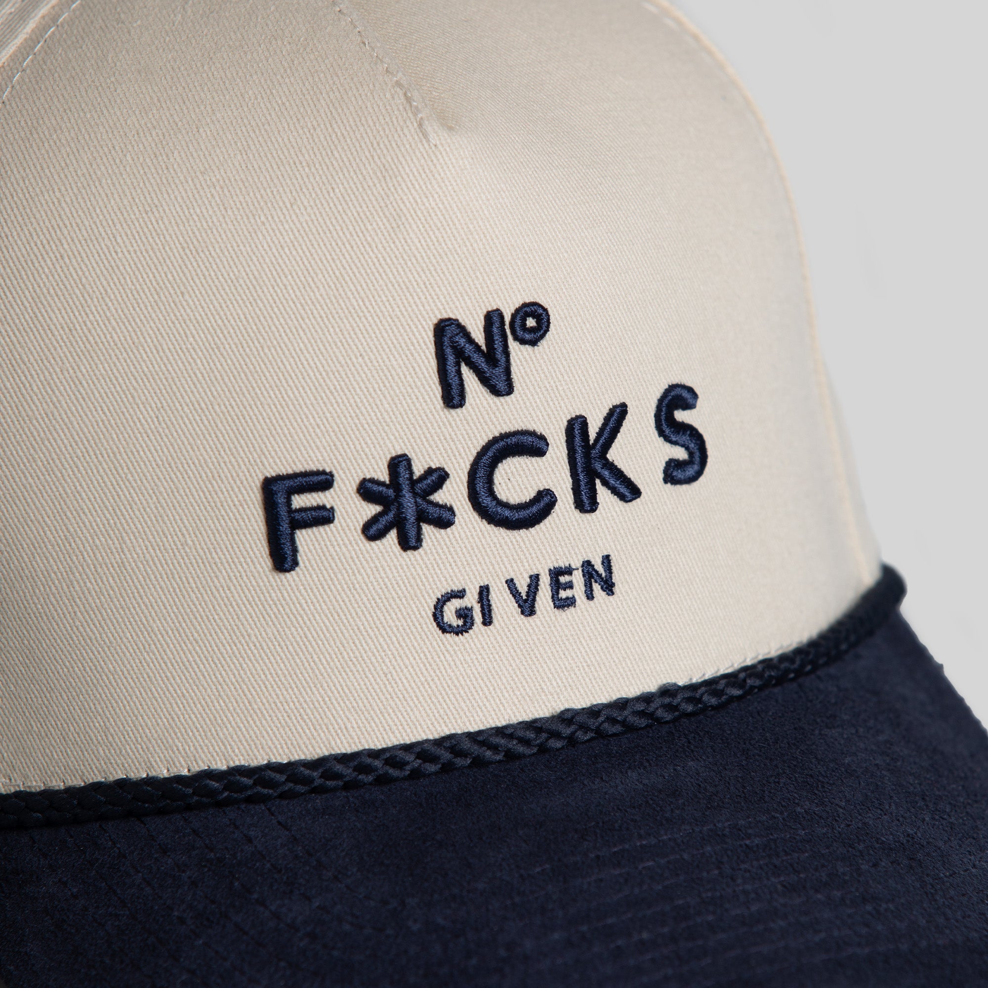 NO F*CKS GIVEN SAND NAVY TWILL/SUEDE TRUCKER HAT