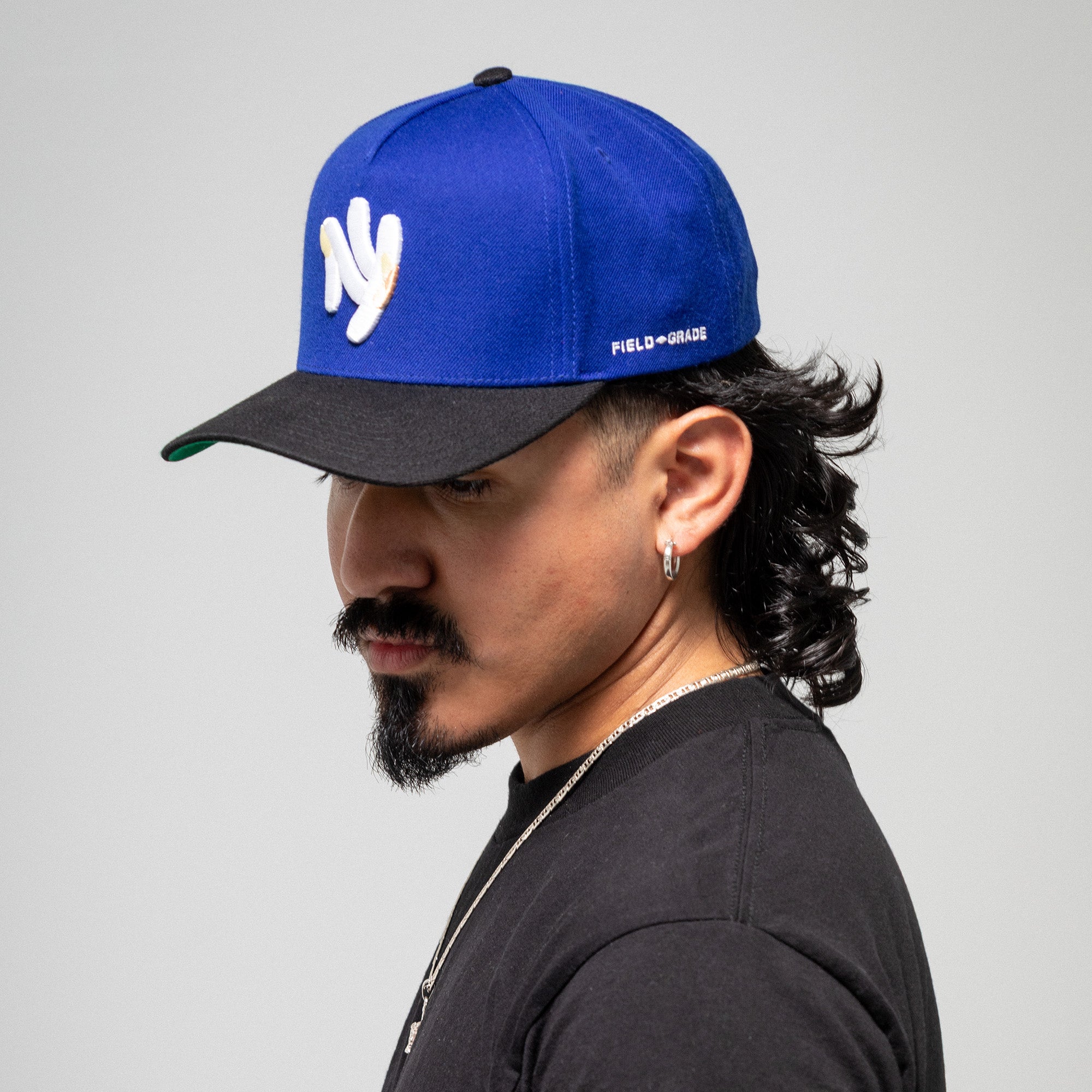 FIELD GRADE X KURVE STUDIO NY IS HEALING ROYAL BLACK WOOL TRUCKER