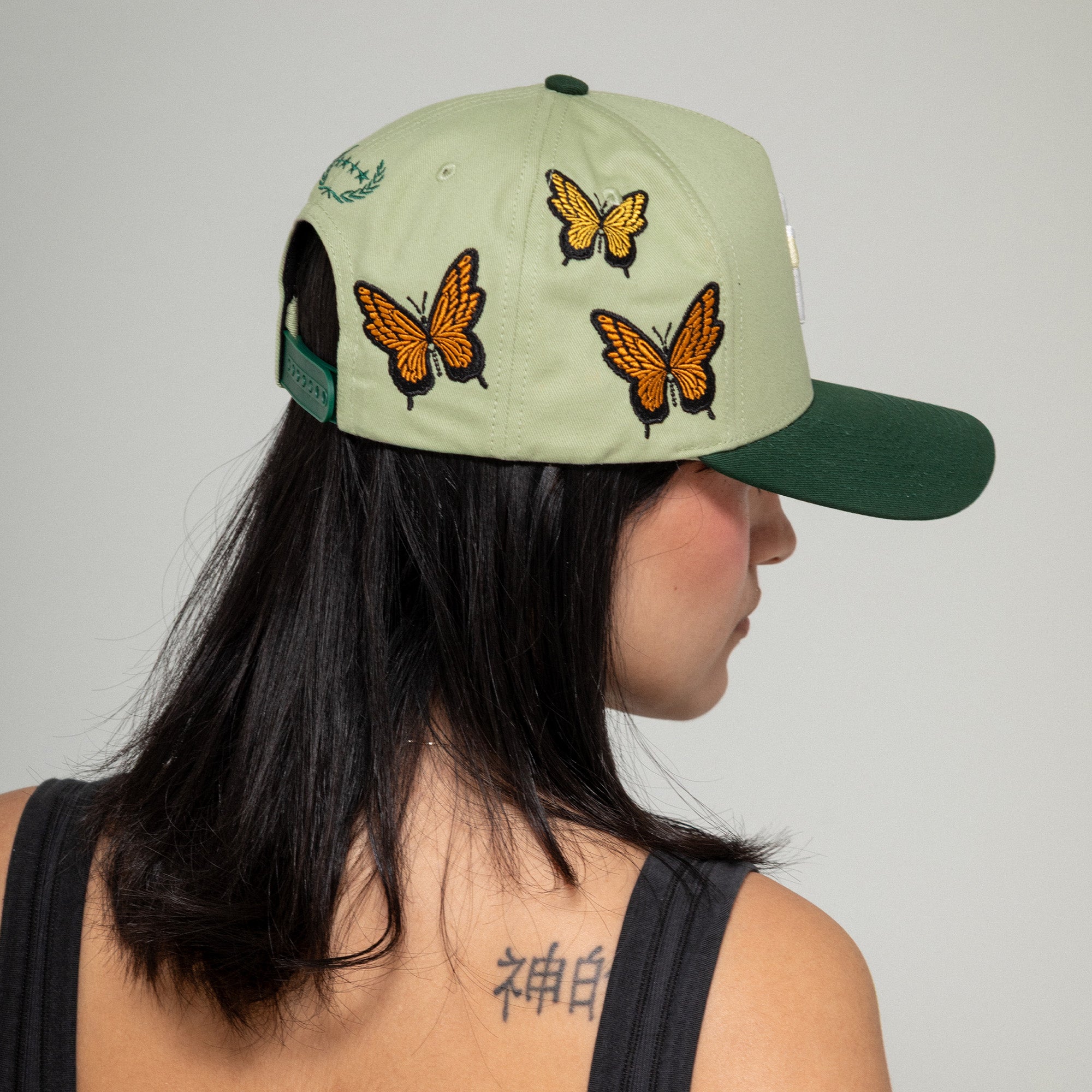 FIELD GRADE X KURVE STUDIO NY IS HEALING BUTTERFLIGHT WOOL TRUCKER