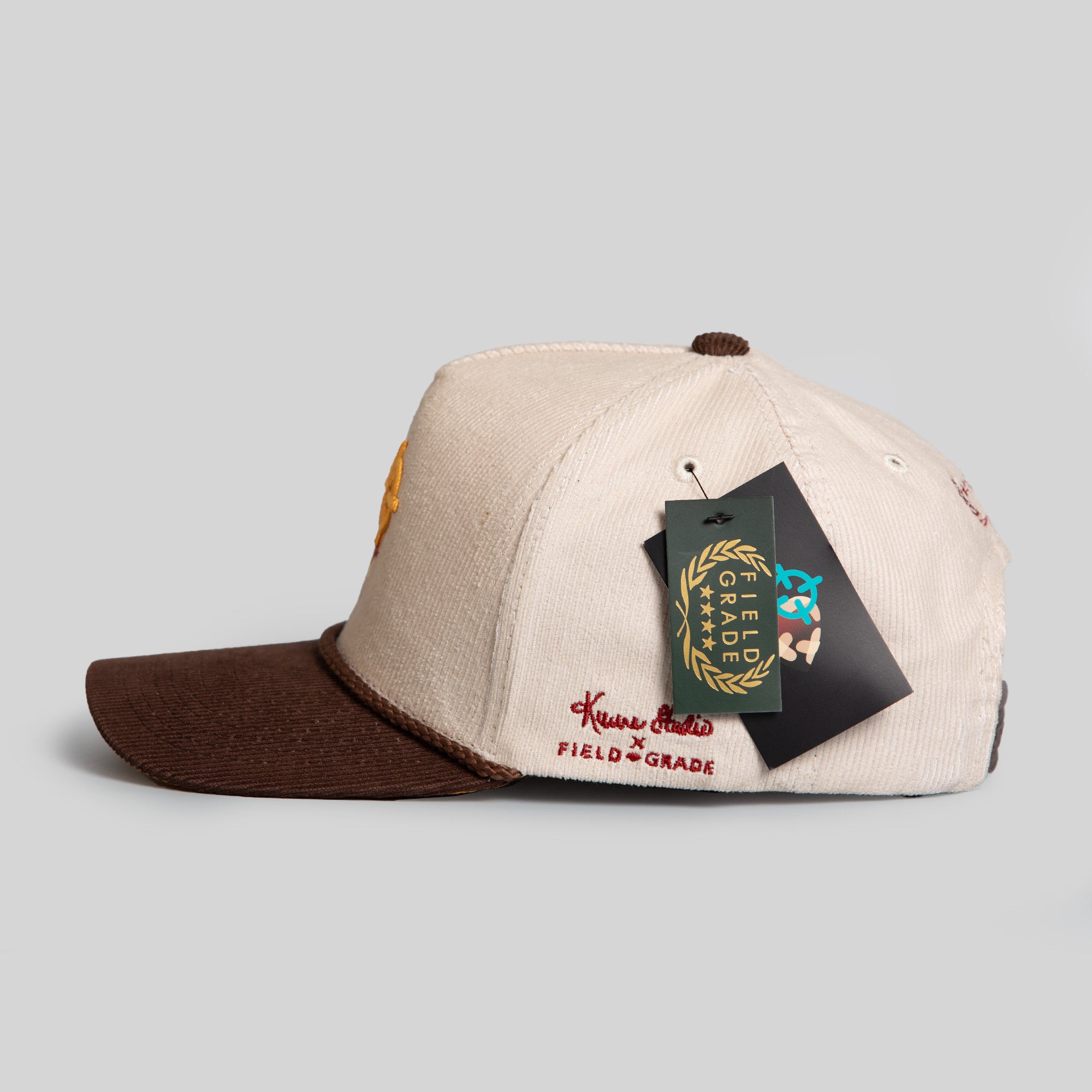 FIELD GRADE X KURVE STUDIO NY IS HEALING STONE/MOCHA TRUCKER HAT