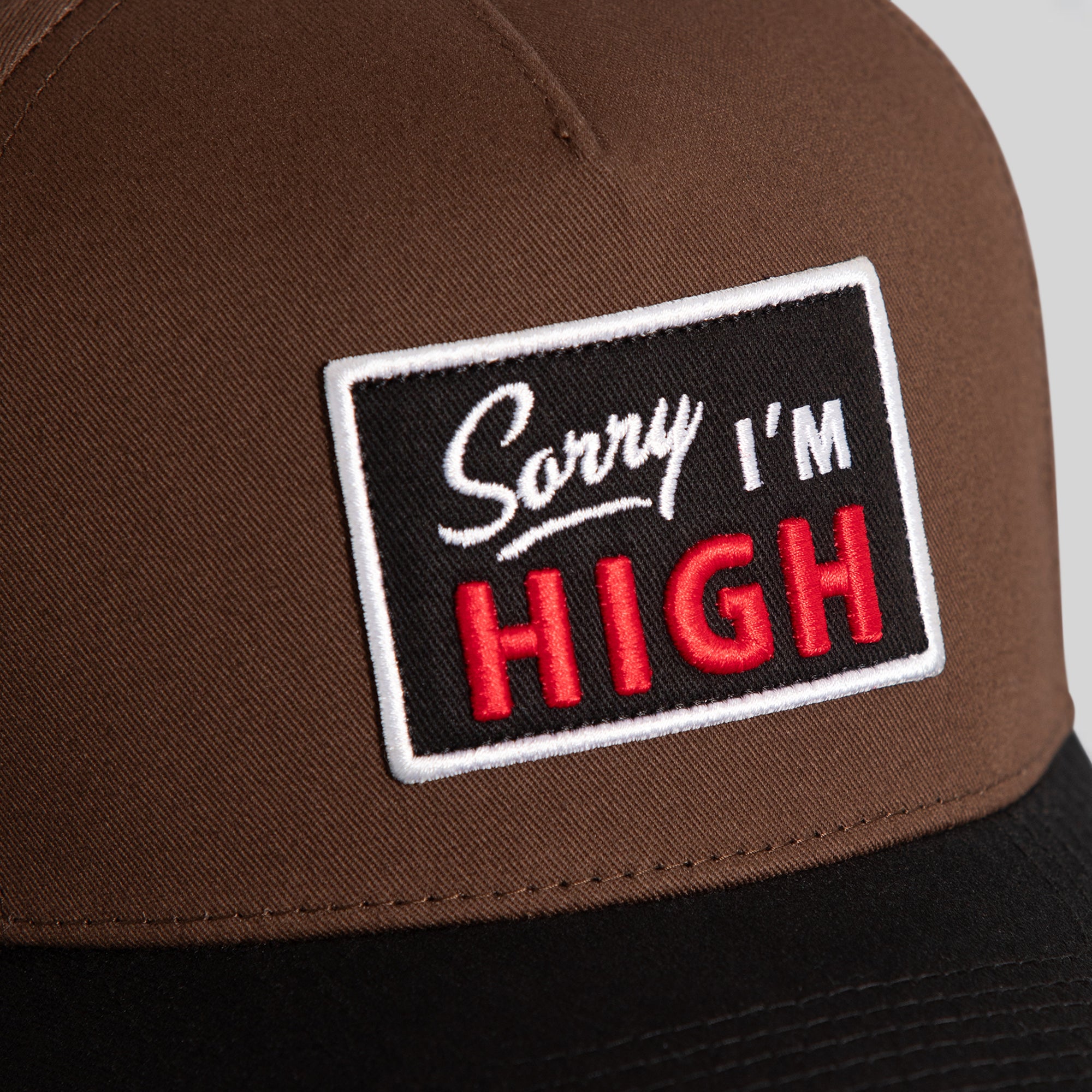 SORRY I'M HIGH MOCHA BLACK TWILL TRUCKER