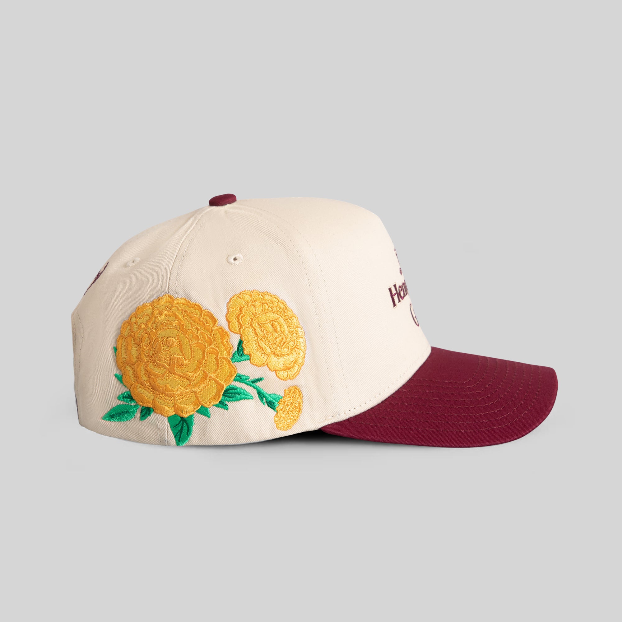 HENNYTHING GOES MARIGOLD SAND BORDEAUX TWILL TRUCKER