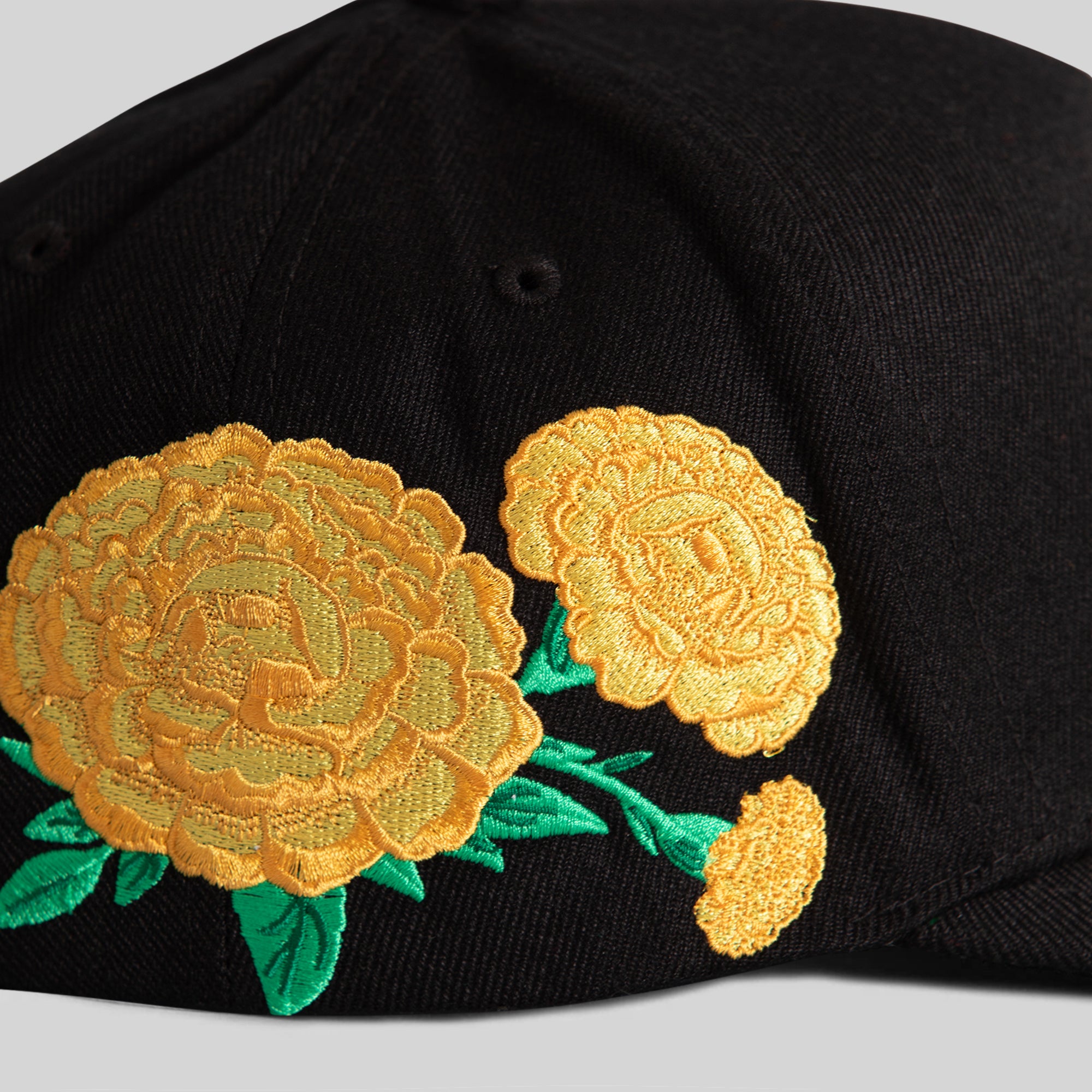 RESPECTFULLY MARIGOLD BLACK WOOL TRUCKER