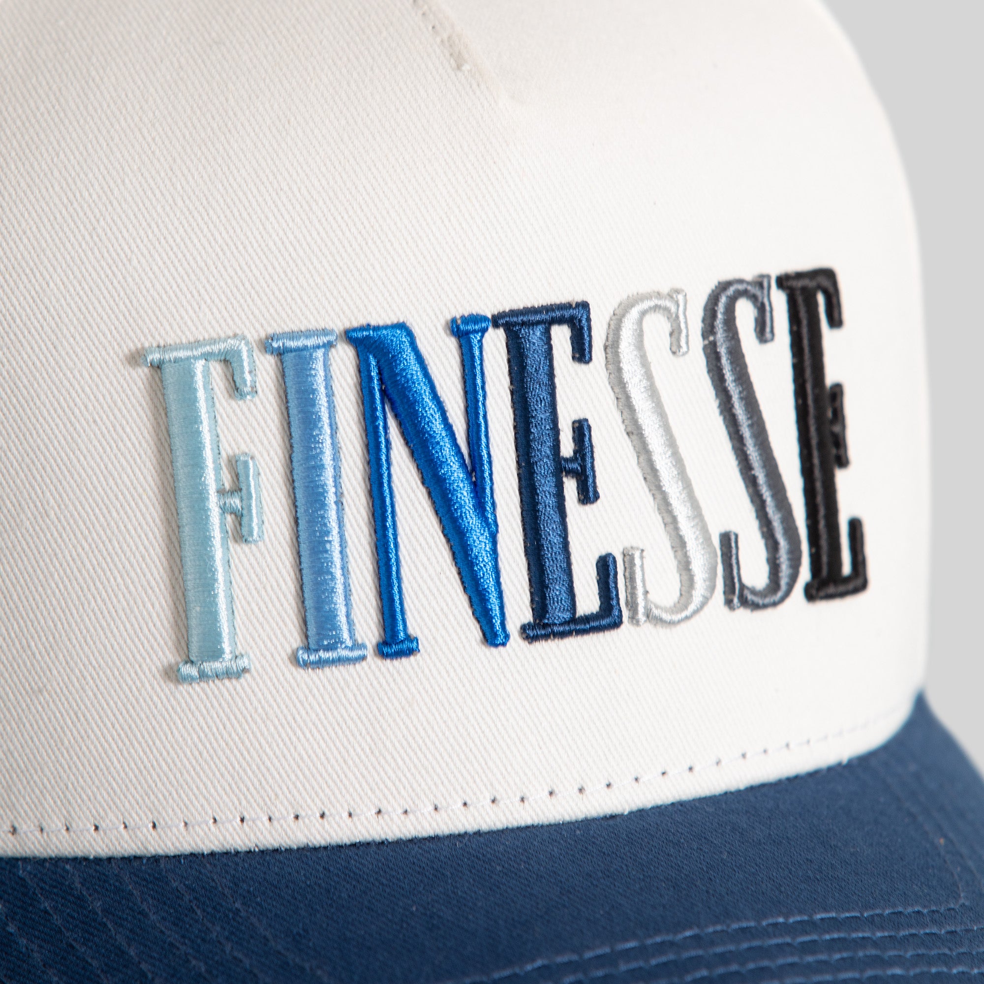 FINESSE OFF WHITE FRENCH BLUE WOOL TRUCKER