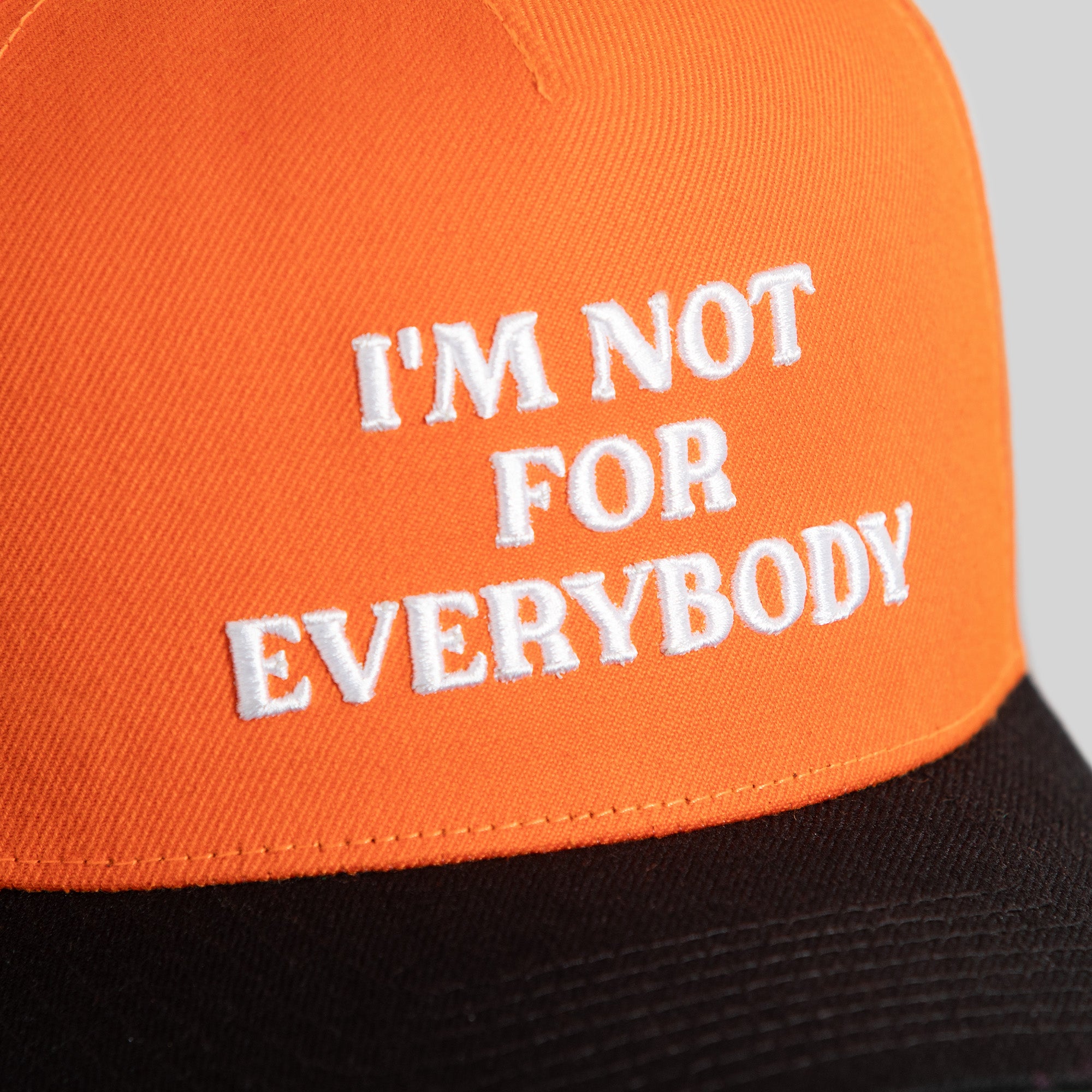 I'M NOT FOR EVERYBODY TOTAL ORANGE BLACK WOOL TRUCKER