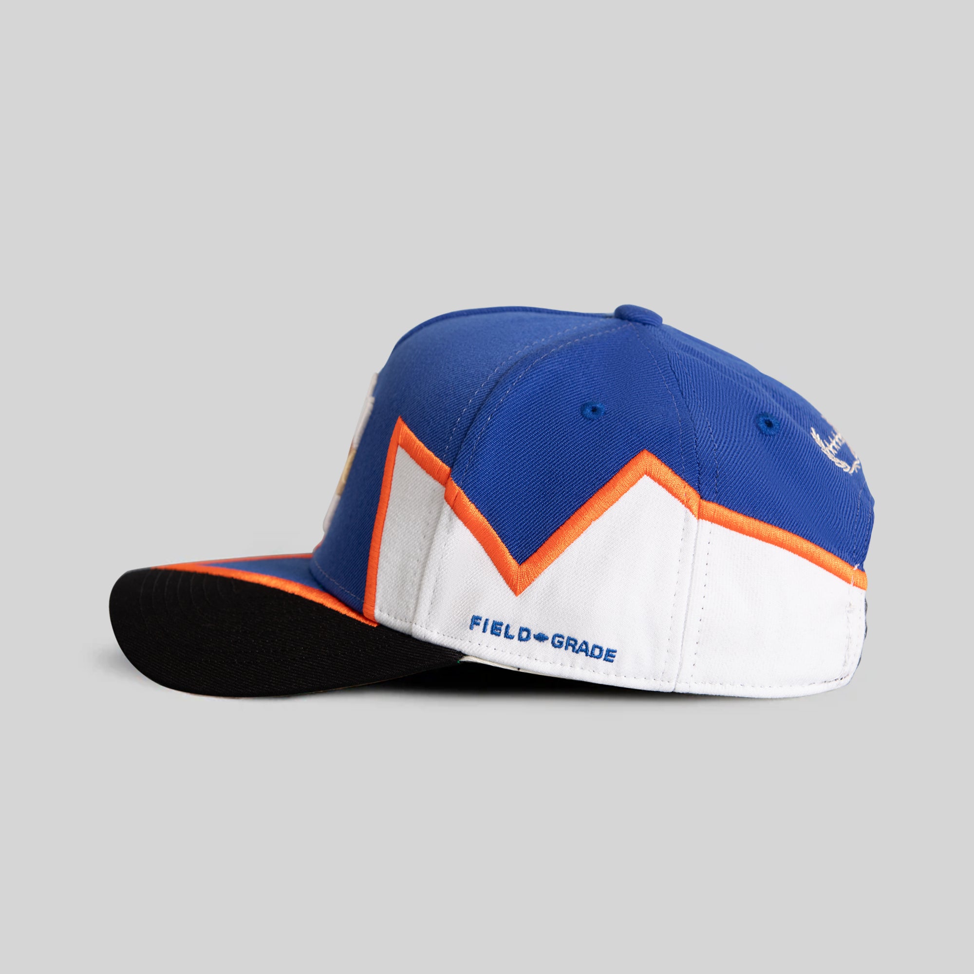 FIELD GRADE X KURVE STUDIO NY IS HEALING QUAKE GAME ROYAL OFF WHITE WOOL TRUCKER