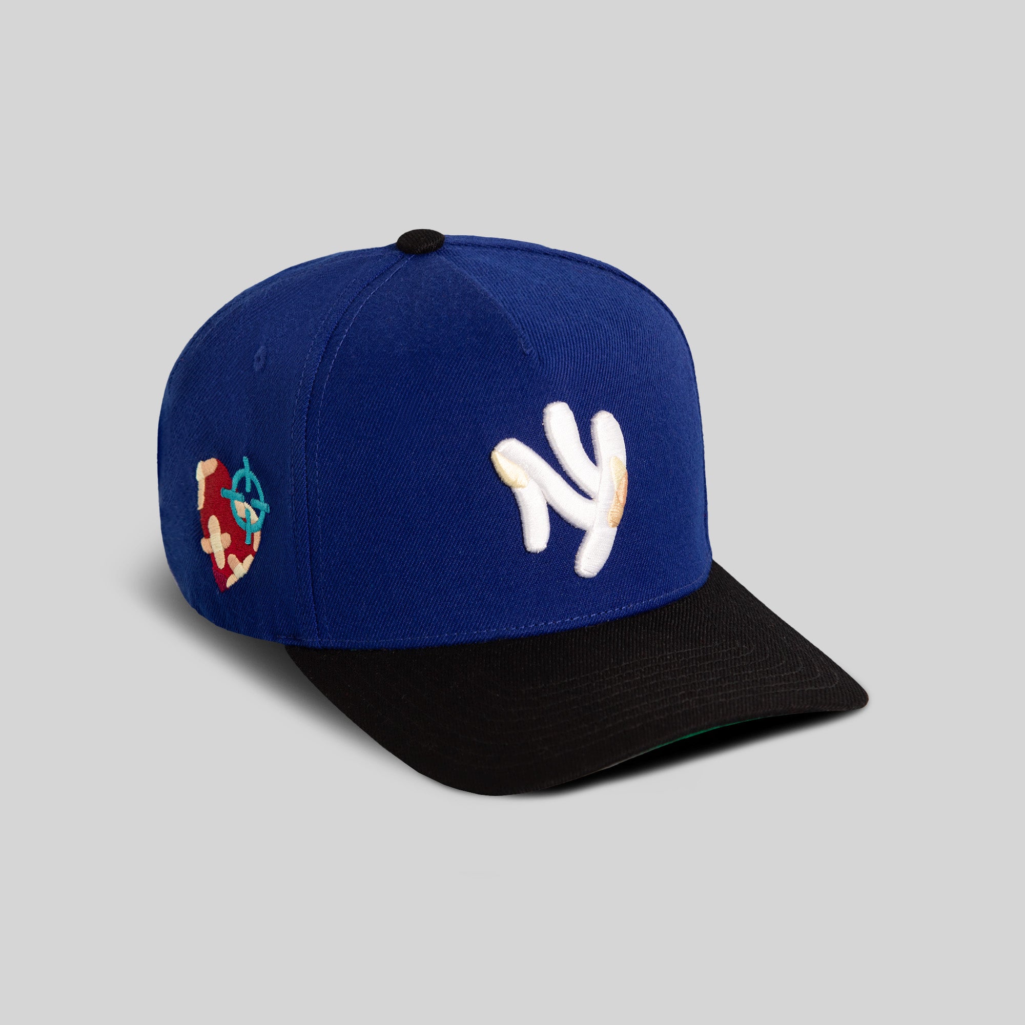 FIELD GRADE X KURVE STUDIO NY IS HEALING ROYAL BLACK WOOL TRUCKER