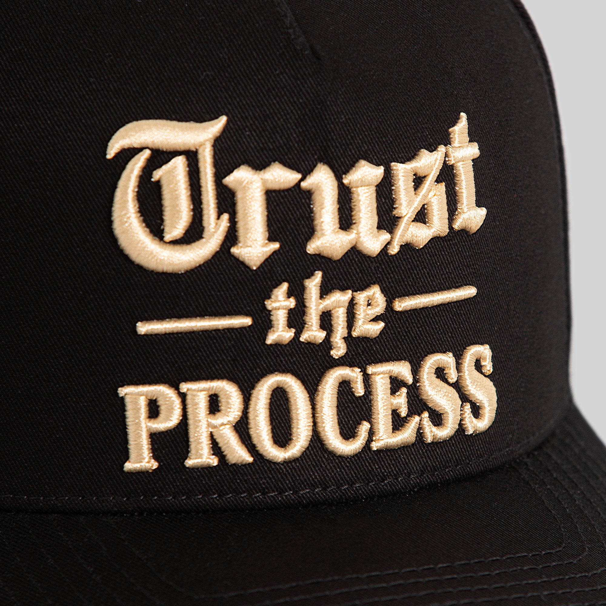 TRUST THE PROCESS BLACK TWILL TRUCKER
