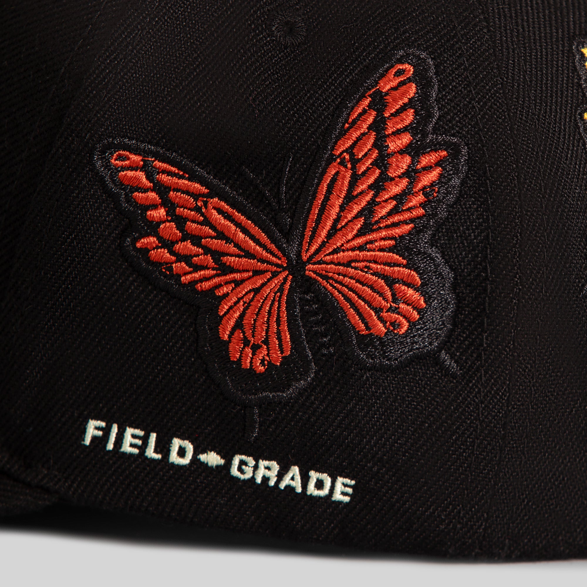FIELD GRADE X KURVE STUDIO NY IS HEALING BUTTERFLIGHT WOOL TRUCKER