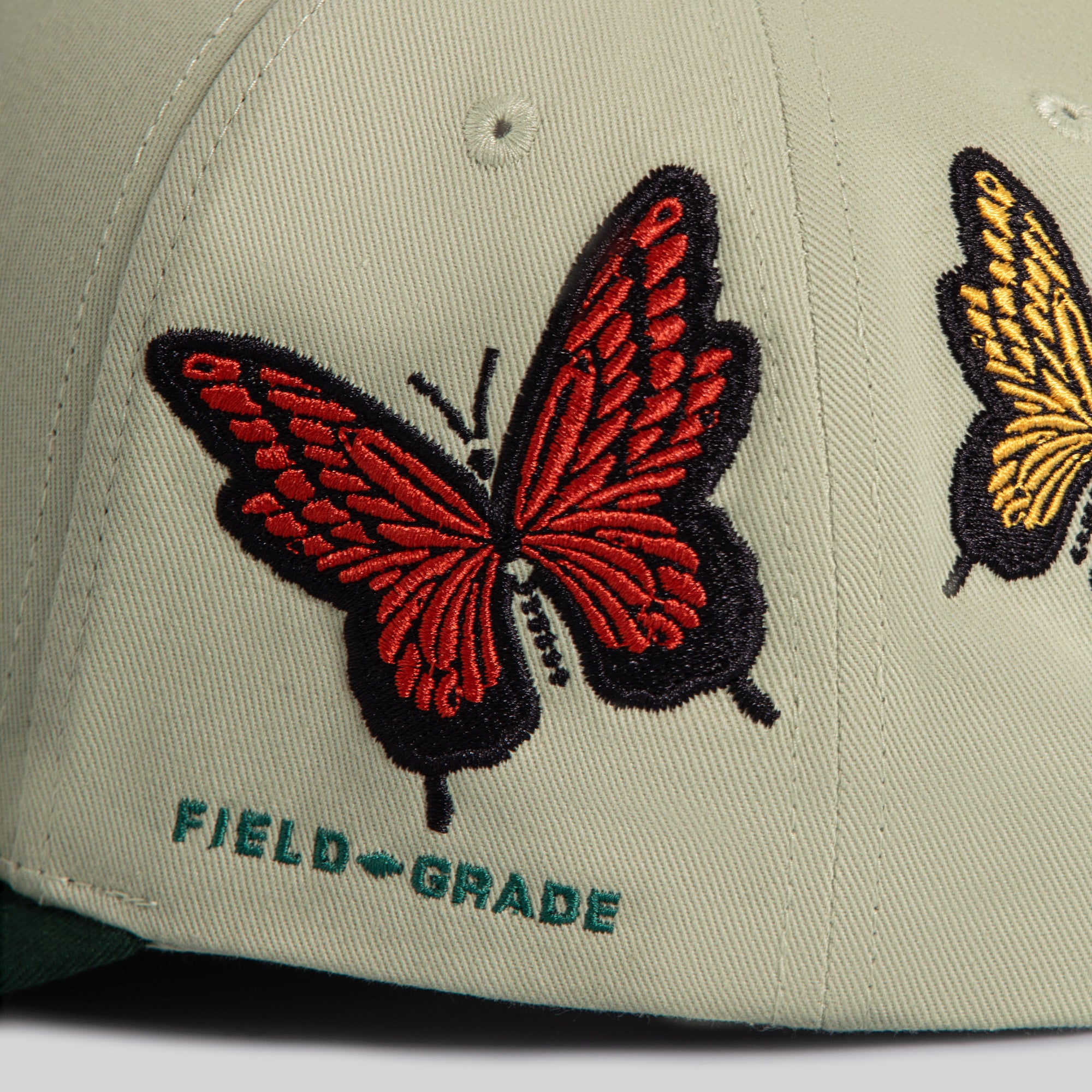 FIELD GRADE X KURVE STUDIO NY IS HEALING BUTTERFLIGHT WOOL TRUCKER