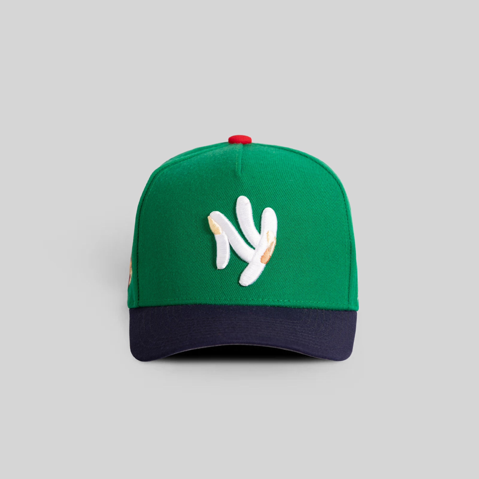 FIELD GRADE X KURVE STUDIO NY IS HEALING KELLY GREEN NAVY TRUCKER