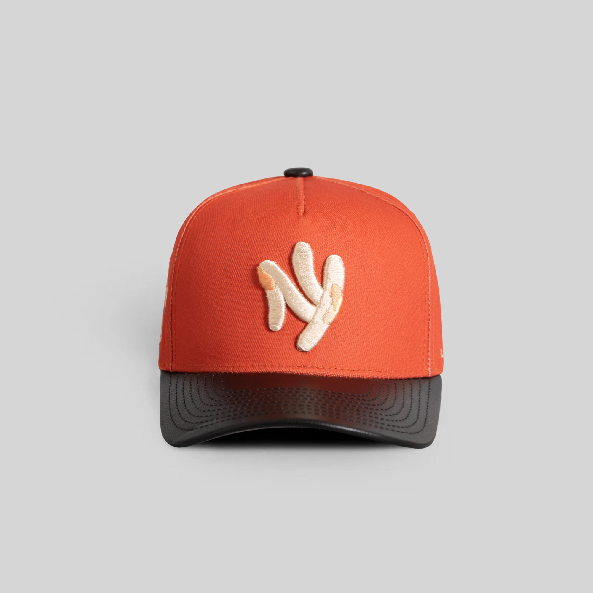 FIELD GRADE X KURVE STUDIO NY IS HEALING BURNT ORANGE BLACK WOOL LEATHER TRUCKER