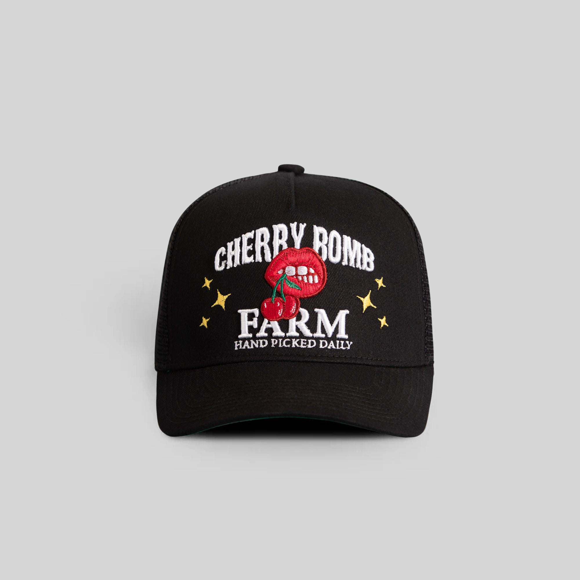 CHERRY BOMB BLACK TWILL MESH TRUCKER